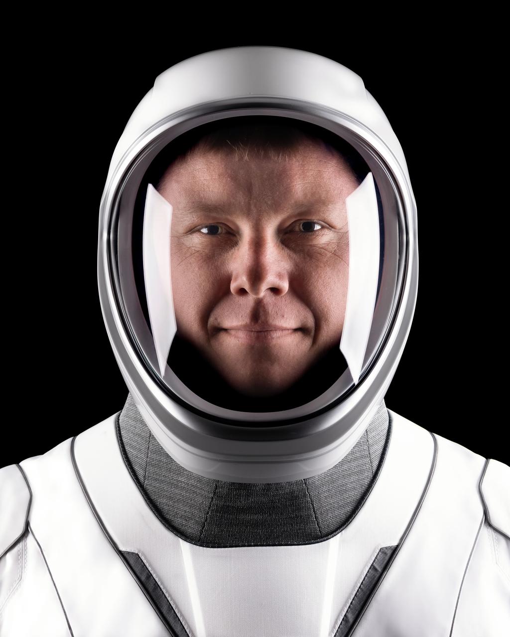 jsc2024e052334 (June 23, 2024) --- SpaceX Crew-9 Mission Specialist Aleksandr Gorbunov of NASA's Commercial Crew Program poses for a portrait in his flight suit at SpaceX headquarters in Hawthorne, California. Credit: SpaceX