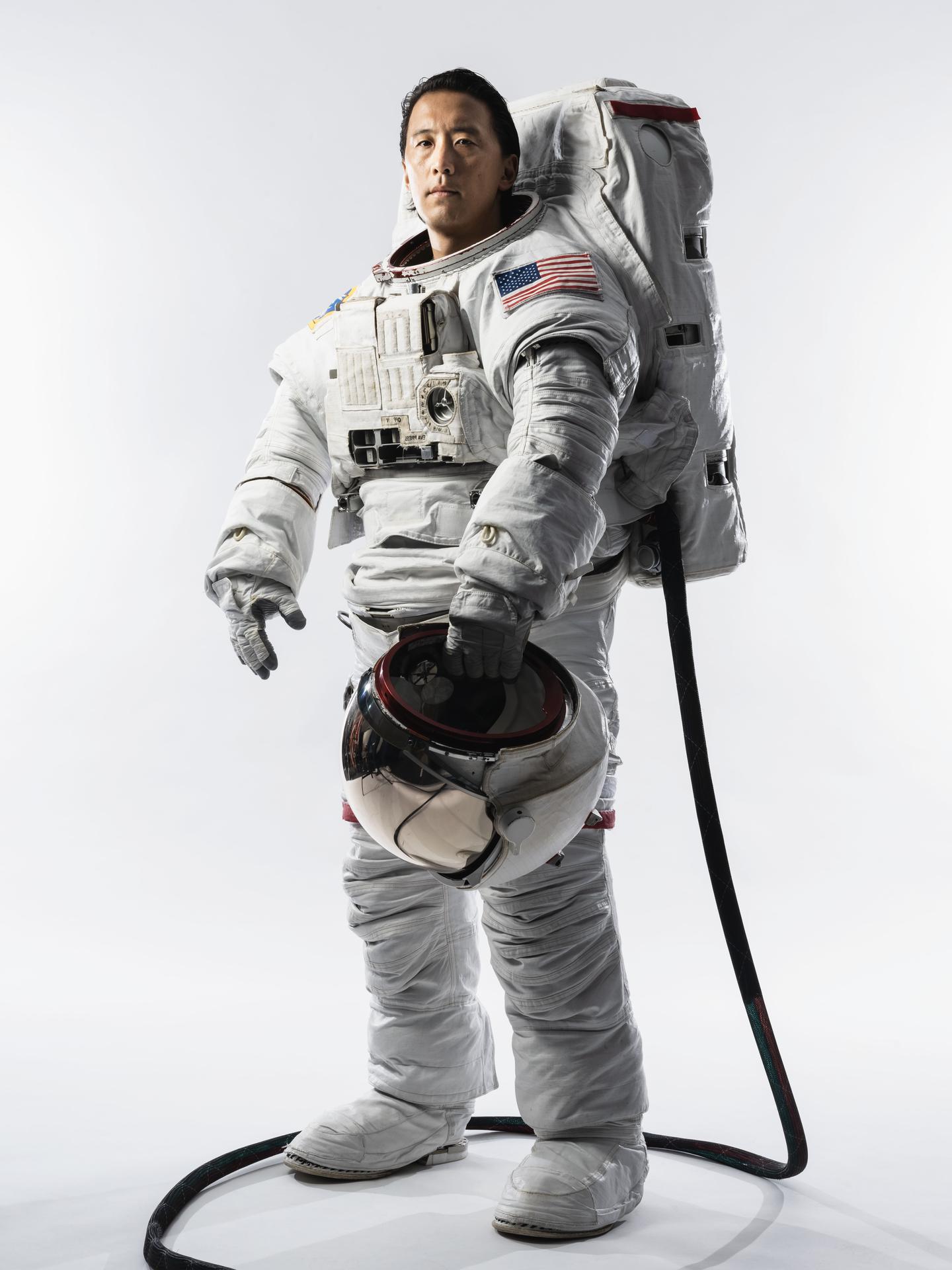 Portrait of NASA Astronaut Jonny Kim in an Extravehicular Mobility Unit (EMU) spacesuit taken at NASA's Johnson Space Center in Houston, Texas.