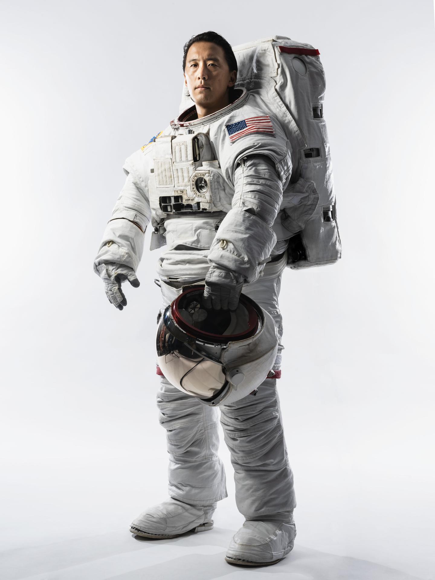 Portrait of NASA Astronaut Jonny Kim in an Extravehicular Mobility Unit (EMU) spacesuit taken at NASA's Johnson Space Center in Houston, Texas.