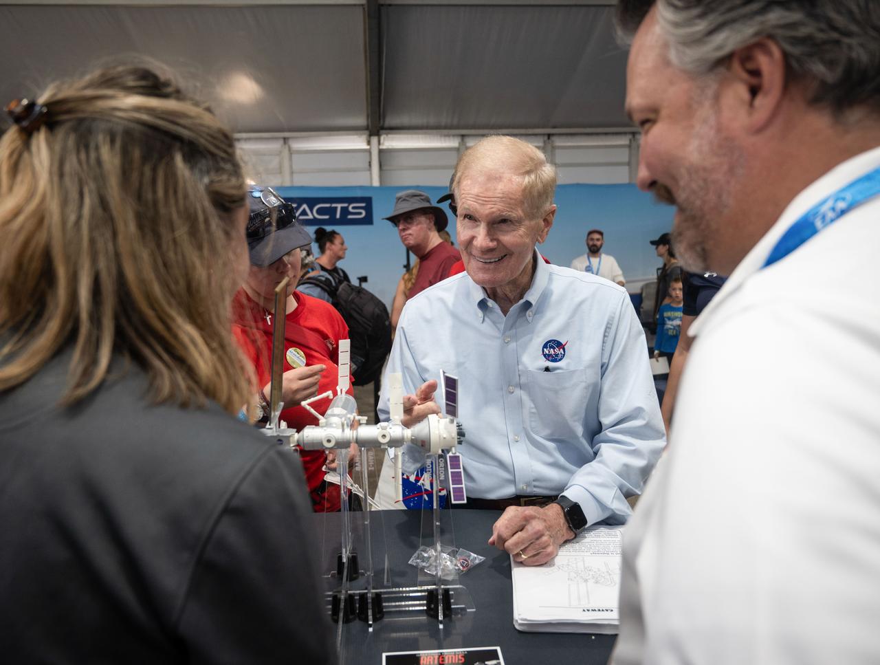  jsc2024e055759 (July 23, 2024) -- NASA Administrator Bill Nelson views of model of Gateway during EAA AirVenture Oshkosh 2024. The Gateway lunar space station will play a crucial role in NASA's Artemis missions.  Photo Credit: NASA/Andrew Carlsen  