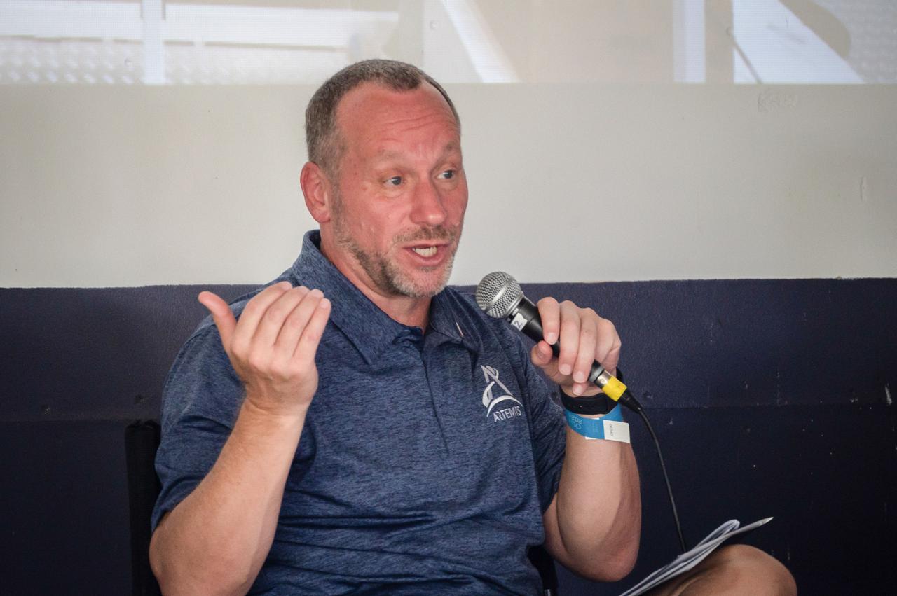 jsc2024e055764 (July 26, 2024) -- Dr. Jon Olansen discusses lunar habitation during the "Living the Lunar Life" forum at EAA AirVenture Oshkosh 2024. As Gateway Program Manager, Olansen highlights the innovative technologies and mission planning essential for living and working in the harsh environment of deep space. Photo Credit: NASA/Andrew Carlsen  