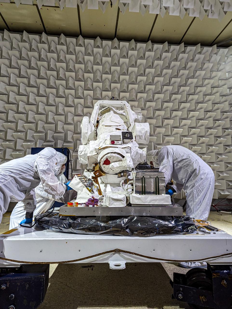 jsc2024e061947 (12/8/2023) --- Team members prepare the COronal Diagnostic EXperiment (CODEX) instrument for Electromagnetic Interference and Electromagnetic Compatibility testing at Goddard Space Flight Center. These tests ensure that CODEX will operate as intended in its shared operating environment while, at the same time, not affecting the ability of other equipment within the same environment to operate as intended. Credit: CODEX team / NASA