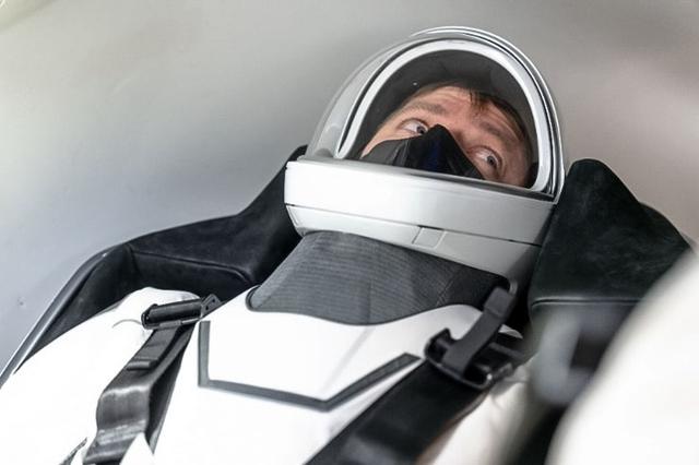 jsc2024e064443 - Roscosmos cosmonaut and mission specialist of NASA’s SpaceX Crew-10 mission Kirill Peskov is pictured training inside a Dragon mockup crew vehicle at the company's in Hawthorne, California. Credit: SpaceX