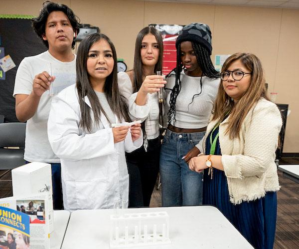 jsc2024e066519 (10/7/2024) --- The Comets set up the test tubes for the final trial of their experiment, Effects of Microgravity on Arabidopsis thaliana Seed Germination. Their experiment is part of the Nanoracks-National Center for Earth and Space Science Education-Surveyor-Student Spaceflight Experiments Program Mission 18 to ISS (Nanoracks-NCESSE-Surveyor-SSEP).