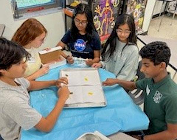 jsc2024e066526 (10/7/2024) --- Randall Middle School students work to optimize the materials and volumes for testing the growth of Trigonella foenum-graecum in microgravity. Their experiment, Fenugreek and its Nutritional Value in Microgravity, is part of the Nanoracks-National Center for Earth and Space Science Education-Surveyor-Student Spaceflight Experiments Program Mission 18 to ISS (Nanoracks-NCESSE-Surveyor-SSEP).