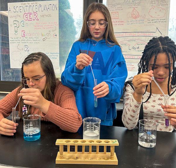 jsc2024e066532 (2/28/2024) --- View of Long Beach, NY student researchers Katrina Casey, Claire Cristallo and Jasmine Davidson-Smith. Their experiment, The Effect of Microgravity on the Germination of Watercress Seeds, is part of the Nanoracks-National Center for Earth and Space Science Education-Surveyor-Student Spaceflight Experiments Program Mission 18 to ISS (Nanoracks-NCESSE-Surveyor-SSEP).