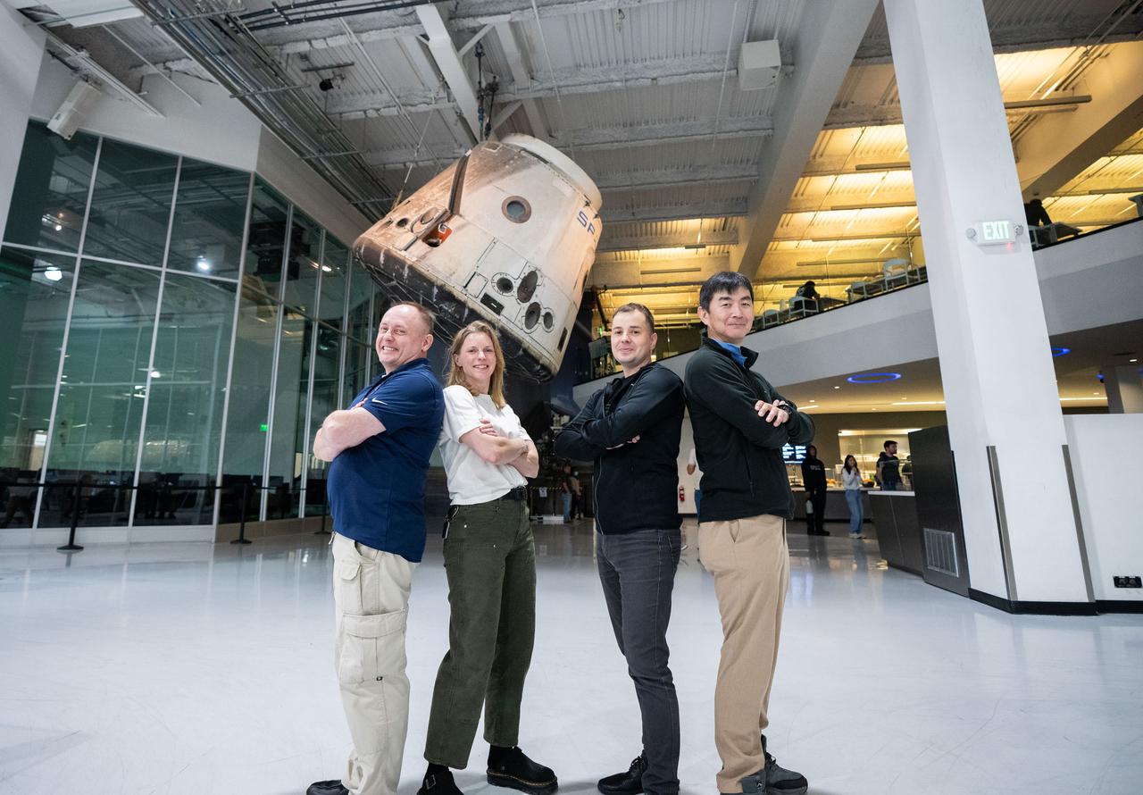jsc2024e070781 (Sept. 25, 2024) --- The four crew members that comprise NASA’s SpaceX Crew-11 mission pose for a photo in front of a spacecraft at the SpaceX facility in Hawthorne, California.  From left are, pilot Mike Fincke, commander Zena Cardman, and mission Specialists Oleg Platonov and Kimiya Yui. Credit: SpaceX