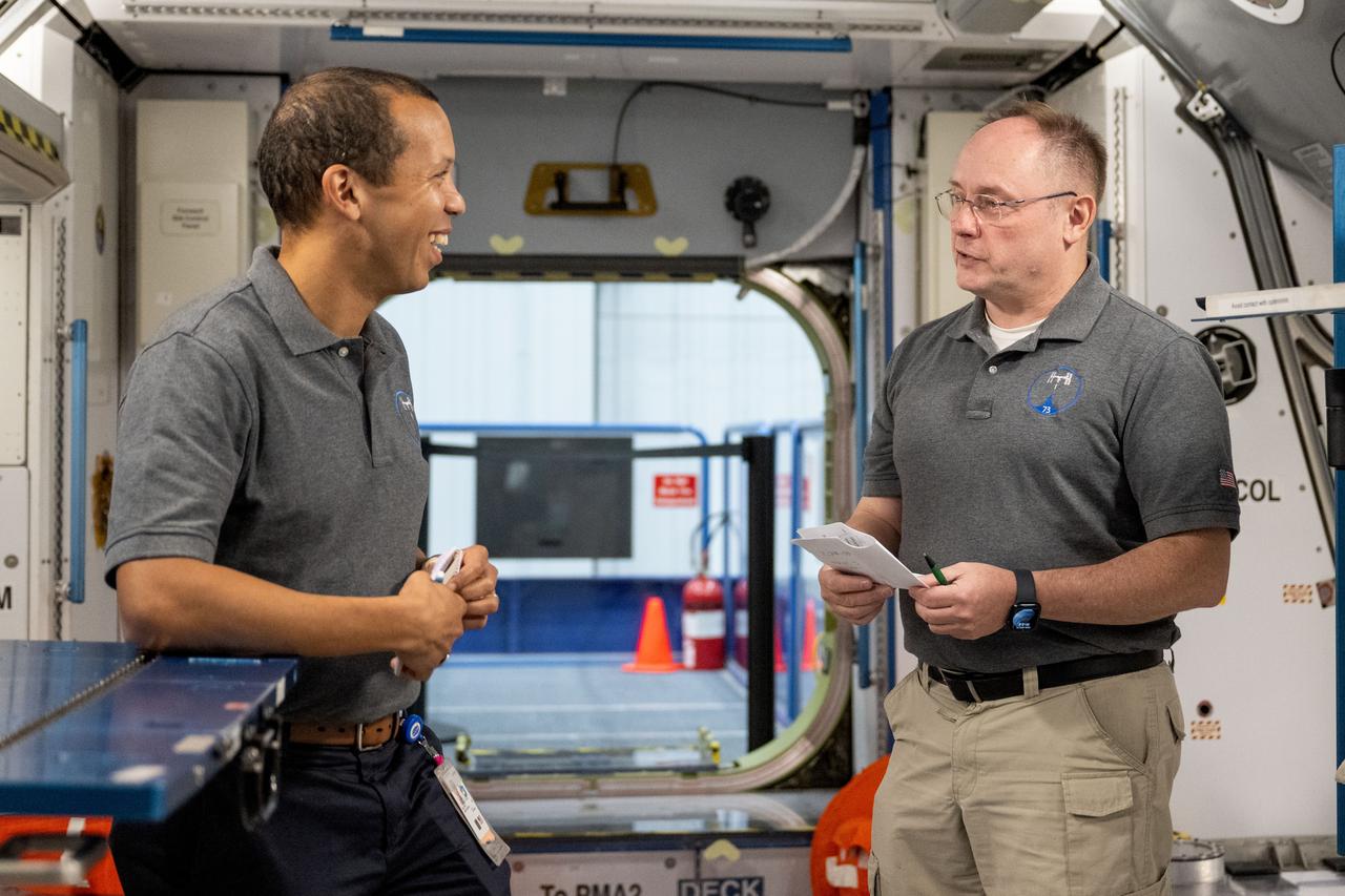 jsc2024e074755 (Nov. 13, 2025) --- NASA astronauts Chris Williams (left) and Mike Fincke (right) participate in a training session at the Space Vehicle Mockup Facility at NASA’s Johnson Space Center in Houston, Texas, to prepare for the unlikely event of an emergency during their International Space Station mission. 