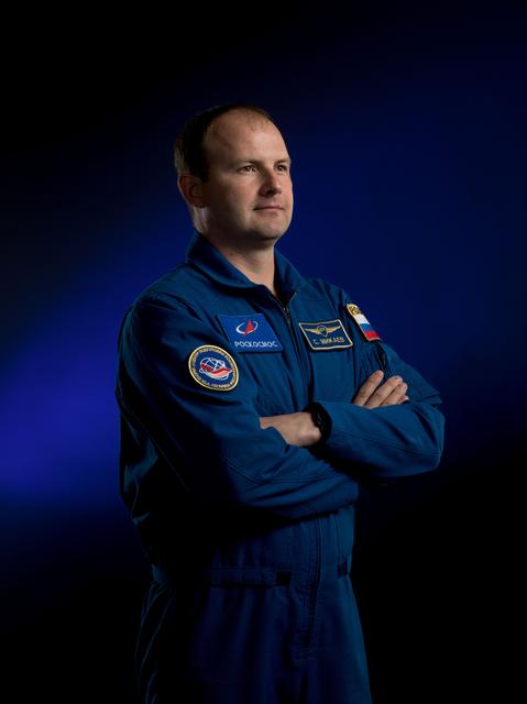 NASA image: Roscosmos cosmonaut Sergey Mikaev poses for a portrait at NASA's Johnson Space Center
