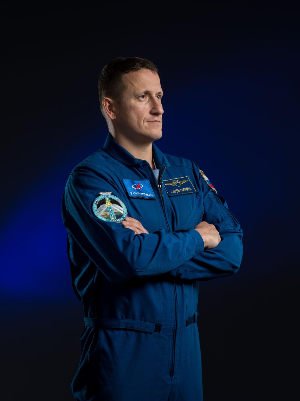 jsc2024e077067_alt (Nov. 25, 2024) --- Roscosmos cosmonaut and Expedition 74 Flight Engineer Sergey Kud-Sverchkov poses for a portrait in his flight suit at NASA's Johnson Space Center in Houston, Texas. Credit: NASA/James Blair