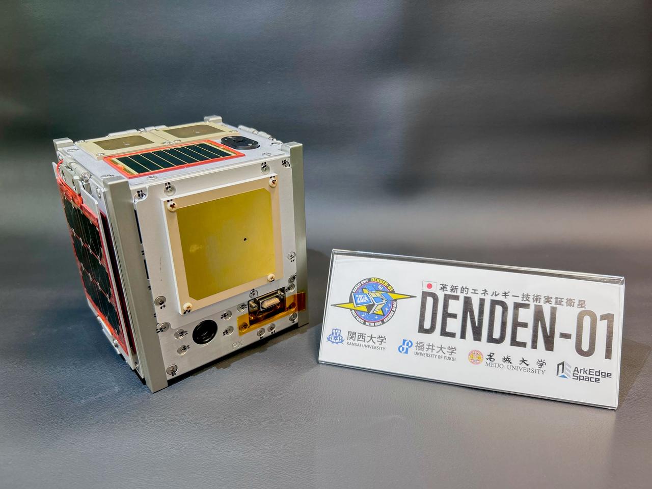 jsc2024e081746 (6/1/2024) --- Preflight imagery of the DENDEN-01 Flight Model, developed by Kansai University in collaboration with University of Fukui, Meijo University, and ArkEdge Space, Inc. DENDEN-01 CubeSat is deployed as part of the JEM Small Satellite Orbital Deployer-30 (J-SSOD-30) CubeSat deployment mission and demonstrates novel power technologies for future nanosatellites, as well as a small hyperspectral camera. Image courtesy of Kansai University.