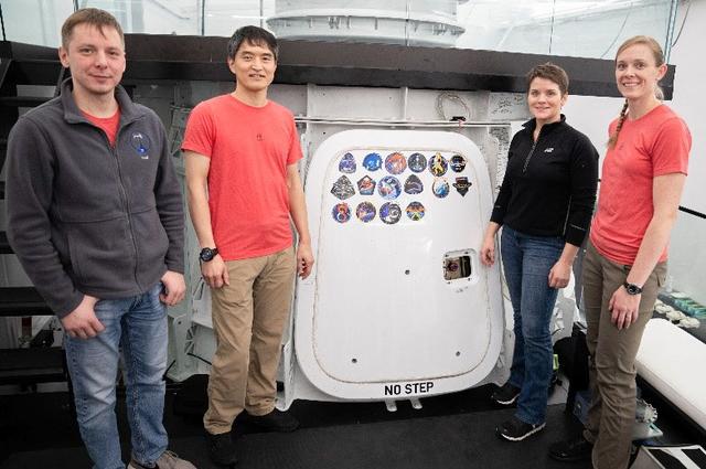 jsc2025e011333 (Feb. 24, 2025) --- NASA's SpaceX Crew-10 crewmembers pose for a portrait in front of the Crew-10 patch at the company’s facility in Hawthorne, California. From left are Mission Specialist Kirill Peskov of Roscosmos, Mission Specialist Takuya Onishi of JAXA (Japan Aerospace Exploration Agency), Commander Anne McClain of NASA, and Pilot Nichole Ayers of NASA. Credit: SpaceX