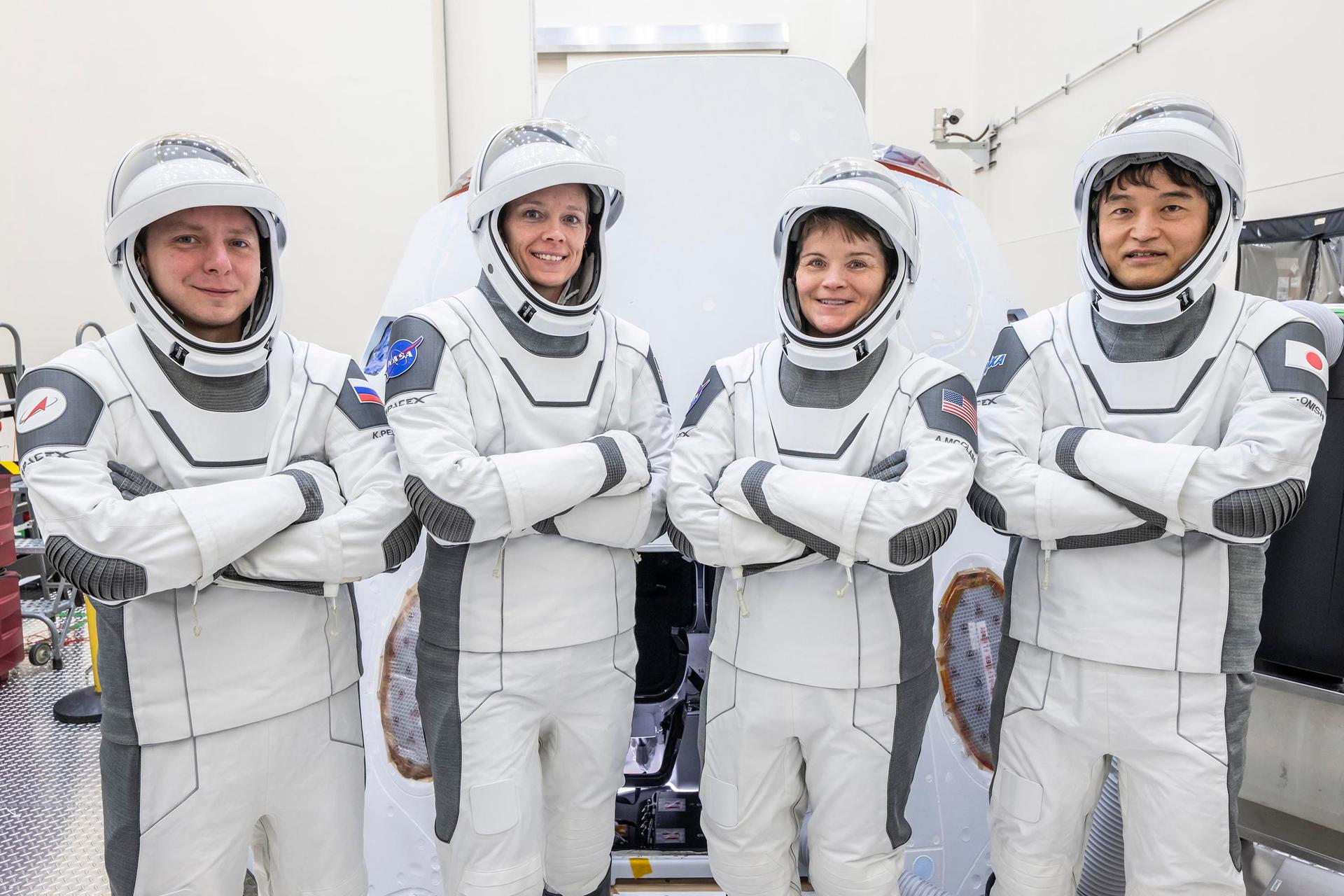 The crew members of NASA’s SpaceX Crew-10 mission (from left) mission specialist Kirill Peskov of Roscosmos, NASA astronauts Nichole Ayers, pilot, and Anne McClain, commander, along with Mission Specialist Takuya Onishi of JAXA (Japan Aerospace Exploration Agency), pose for a picture during training at NASA’s Kennedy Space Center in Florida.