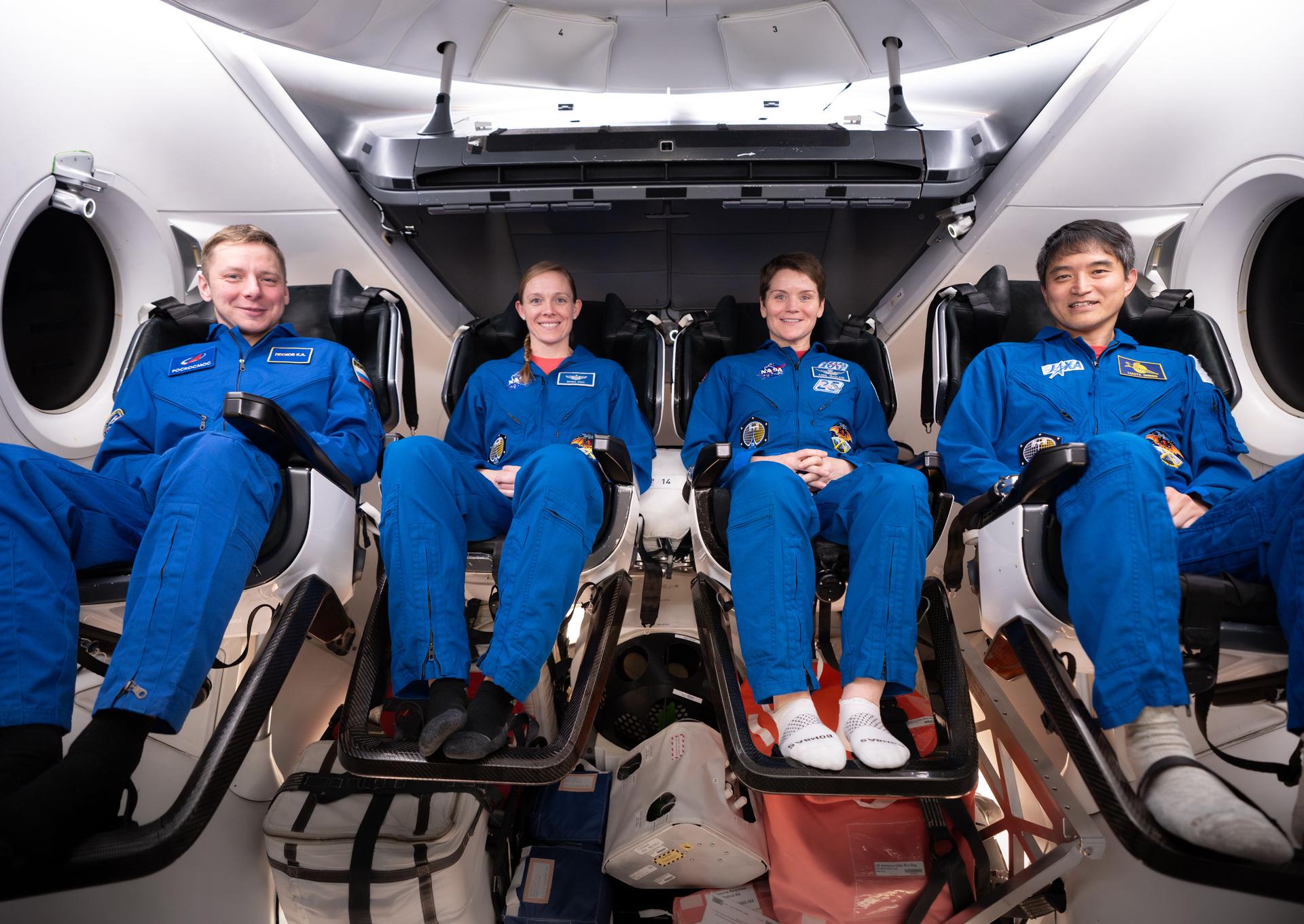 The crew members of NASA’s SpaceX Crew-10 mission (from left) mission specialist Kirill Peskov of Roscosmos, NASA astronauts Nichole Ayers, pilot, and Anne McClain, commander, along with Mission Specialist Takuya Onishi of JAXA (Japan Aerospace Exploration Agency), pose for a picture during training at NASA’s Kennedy Space Center in Florida.