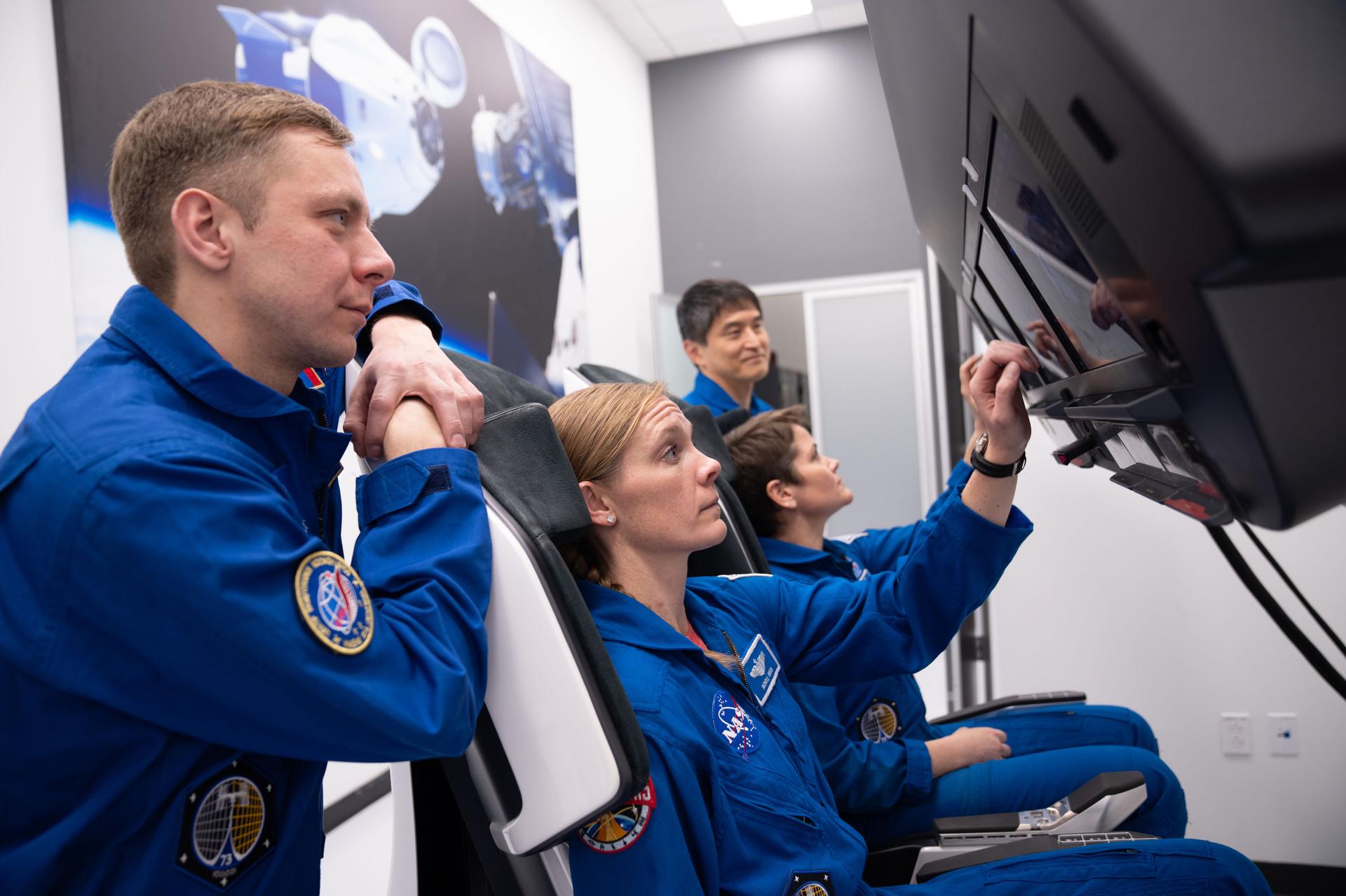 The crew members of NASA’s SpaceX Crew-10 mission (from left) mission specialist Kirill Peskov of Roscosmos, NASA astronauts Nichole Ayers, pilot, and Anne McClain, commander, along with Mission Specialist Takuya Onishi of JAXA (Japan Aerospace Exploration Agency), training before their mission to the International Space Station.