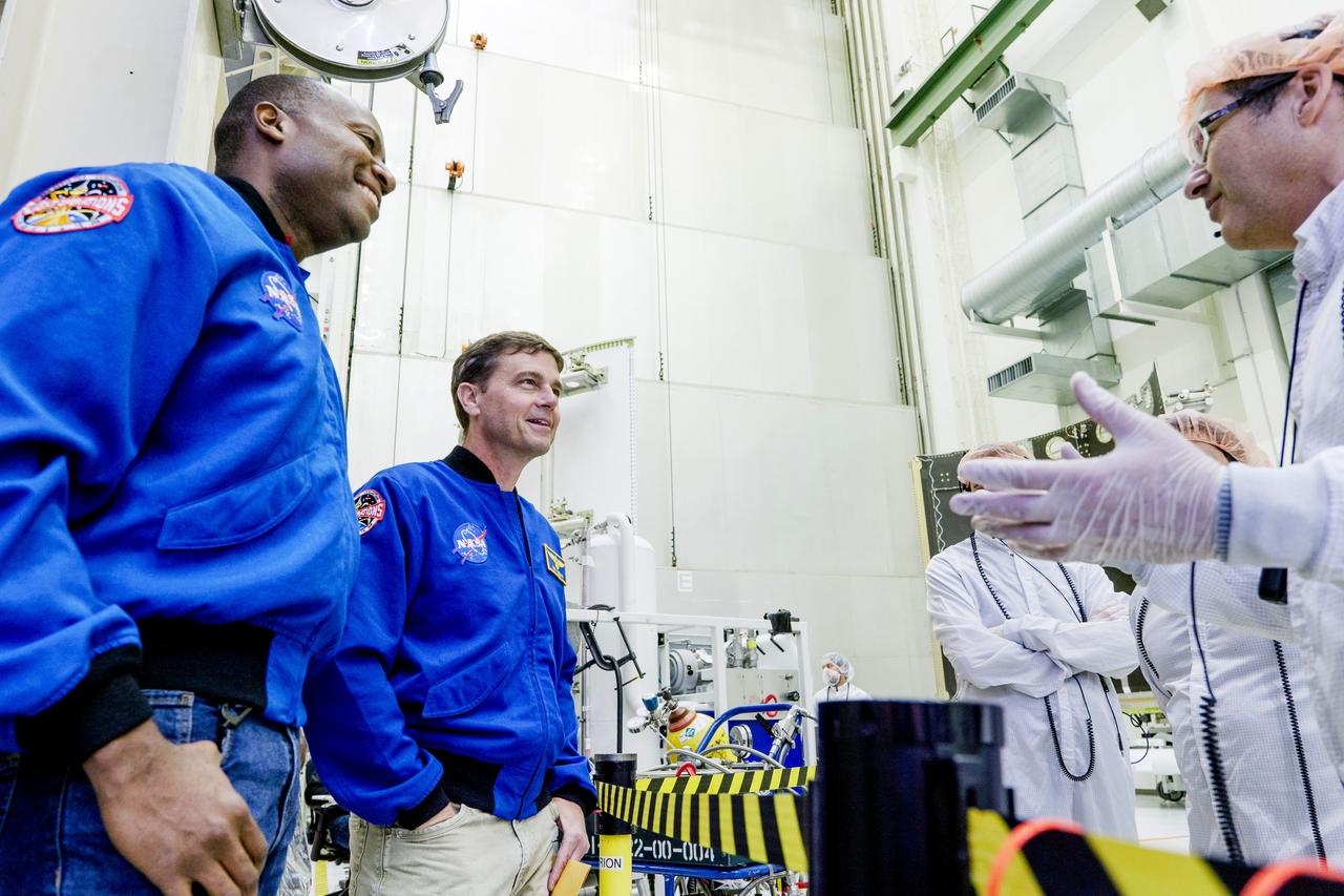 Date: 2/27/2025 Photographer: NASA/Rad Sinyak Caption: Technicians begin working on the installation of the four solar array wings for NASA’s Artemis II Orion spacecraft inside the Operations and Checkout Building at NASA’s Kennedy Space Center on Feb. 27, 2025. Artemis II is Orion’s first crewed flight test around the Moon under the agency’s Artemis campaign.  