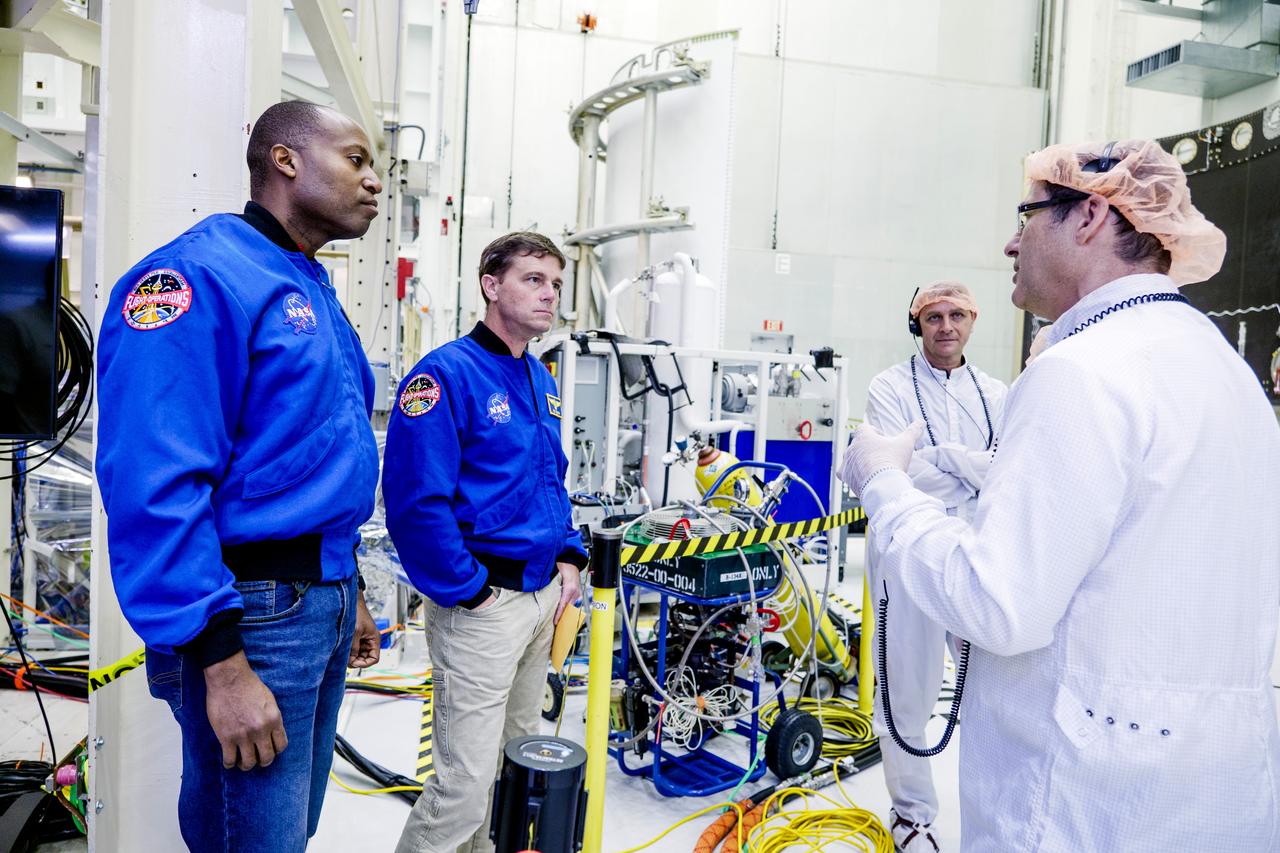 Date: 2/27/2025 Photographer: NASA/Rad Sinyak Caption: Technicians begin working on the installation of the four solar array wings for NASA’s Artemis II Orion spacecraft inside the Operations and Checkout Building at NASA’s Kennedy Space Center on Feb. 27, 2025. Artemis II is Orion’s first crewed flight test around the Moon under the agency’s Artemis campaign.  