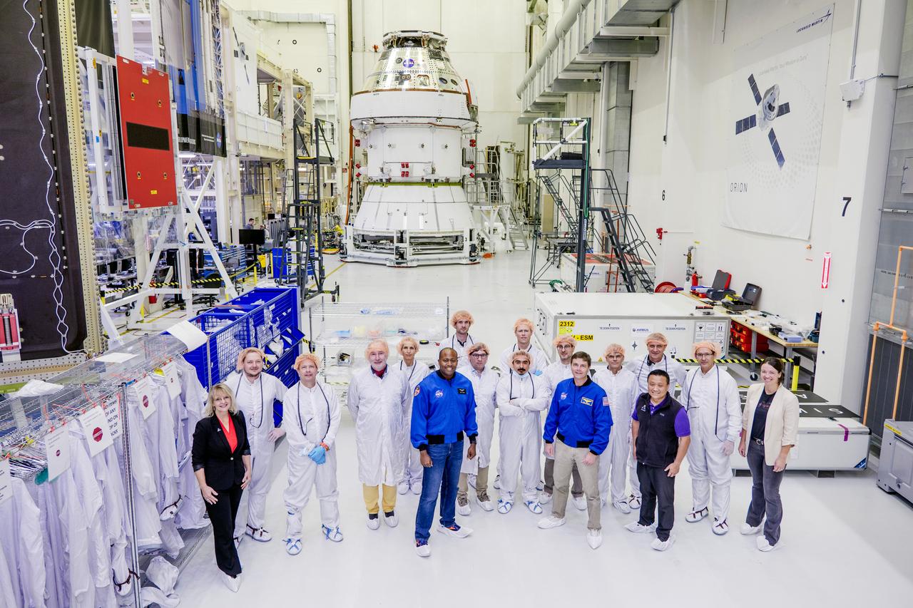 Date: 2/27/2025 Photographer: NASA/Rad Sinyak Caption: Technicians begin working on the installation of the four solar array wings for NASA’s Artemis II Orion spacecraft inside the Operations and Checkout Building at NASA’s Kennedy Space Center on Feb. 27, 2025. Artemis II is Orion’s first crewed flight test around the Moon under the agency’s Artemis campaign.  