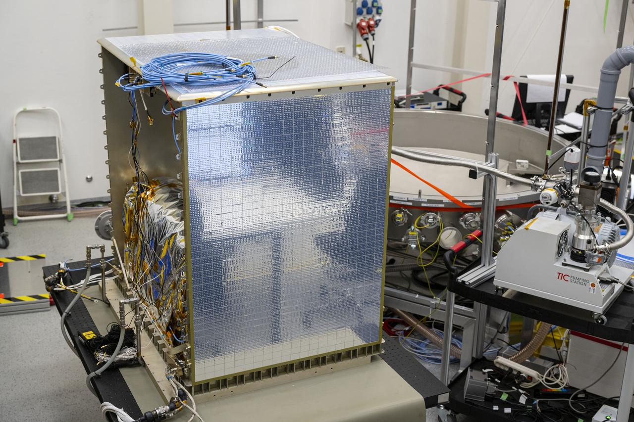 jsc2025e015679 (3/6/2025) --- The closure of the instrument panel of the Atomic Clock Ensemble in Space (ACES) has taken place at Airbus Friedrichshafen, Germany. ACES is an ESA instrument that tests fundamental physics, such as Einstein’s theory of general relativity, from the International Space Station. According to this theory, gravity affects the passing of time—time flies faster at the top of Mount Everest than at sea level. This effect has been proven in experiments on Earth, and ACES will make more precise measurements of this phenomenon and other fundamental physics such as the standard model of particle physics, as it flies 400 km high on the space station. ACES contains two clocks: PHARAO, a caesium atomic clock developed by the French Space Agency CNES, and the Space Hydrogen Maser developed by Spectratime, which uses hydrogen atoms as a frequency reference. The payload will be externally mounted to ESA’s Columbus laboratory on the space station. Image courtesy of S. Corvaja (ESA).