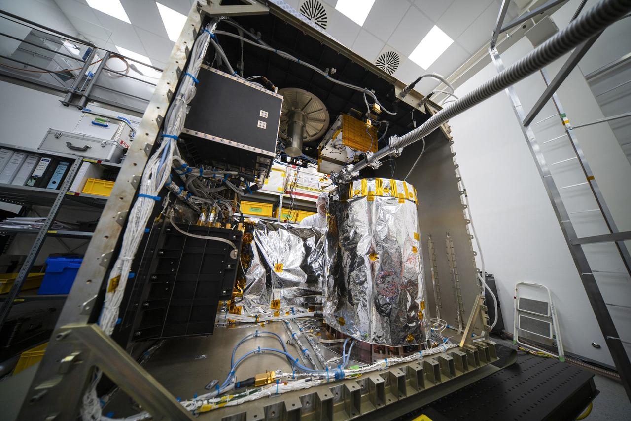 jsc2025e015680 (3/6/2025) --- The closure of the instrument panel of the Atomic Clock Ensemble in Space (ACES) has taken place at Airbus Friedrichshafen, Germany. ACES is an ESA instrument that tests fundamental physics, such as Einstein’s theory of general relativity, from the International Space Station. According to this theory, gravity affects the passing of time—time flies faster at the top of Mount Everest than at sea level. This effect has been proven in experiments on Earth, and ACES will make more precise measurements of this phenomenon and other fundamental physics such as the standard model of particle physics, as it flies 400 km high on the space station. ACES contains two clocks: PHARAO, a caesium atomic clock developed by the French Space Agency CNES, and the Space Hydrogen Maser developed by Spectratime, which uses hydrogen atoms as a frequency reference. The payload will be externally mounted to ESA’s Columbus laboratory on the space station. Image courtesy of S. Corvaja (ESA).
