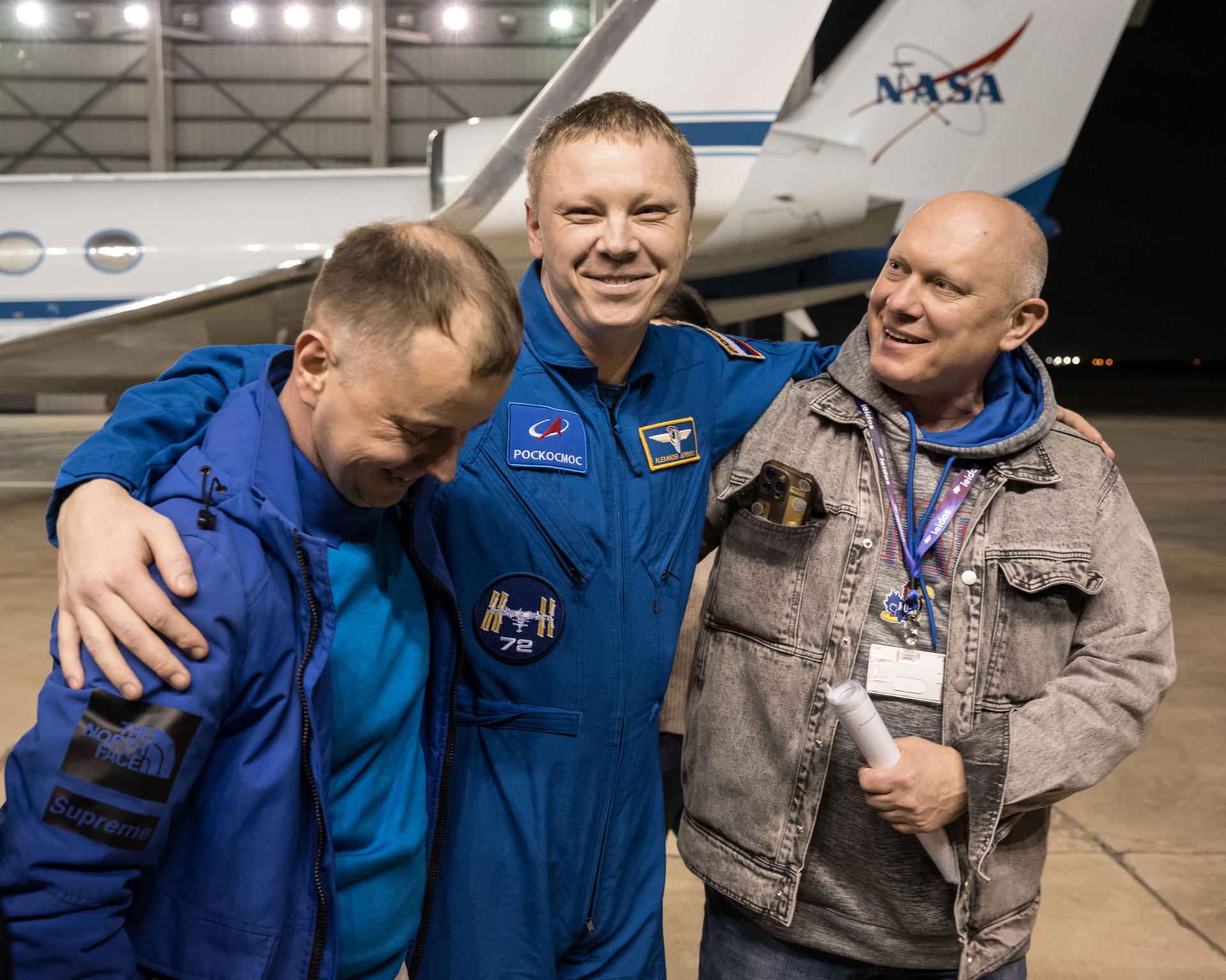 Roscosmos cosmonaut Aleksandr Gorbunov smiles as he returns to Johnson Space Center's Ellington Field in Houston after completing a long-duration science mission aboard the International Space Station. After undocking from the orbiting laboratory, NASA’s SpaceX Crew-9 splashed down at 5:57 p.m. EDT on Tuesday, March 18, in the Gulf of America near Tallahassee, Florida.