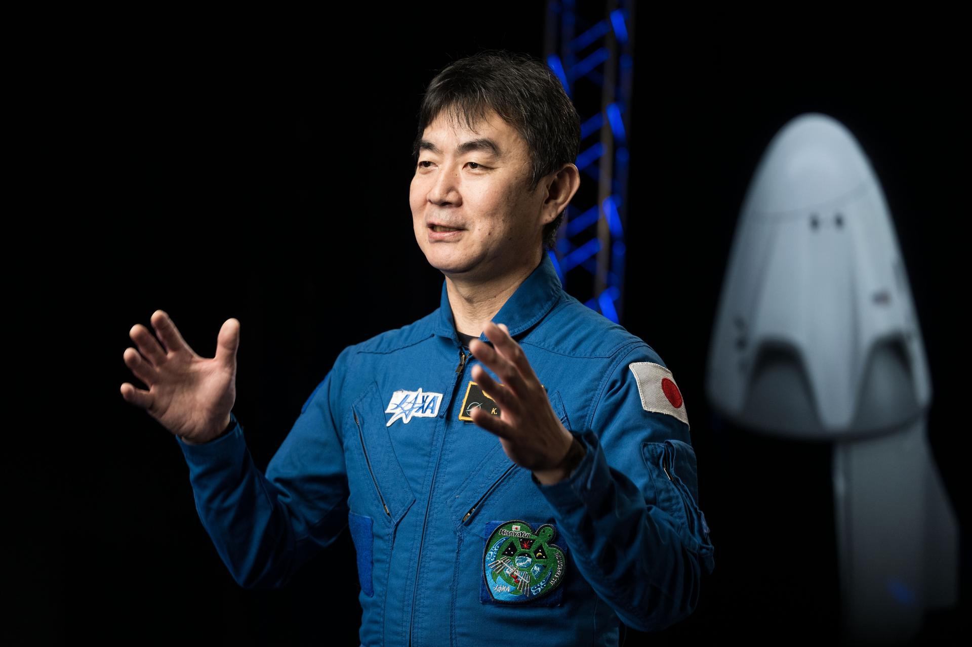 JAXA astronaut Kimiya Yui is photographed during an interview in a studio at NASA’s Johnson Space Center in Houston, Texas, before his upcoming mission to the International Space Station.