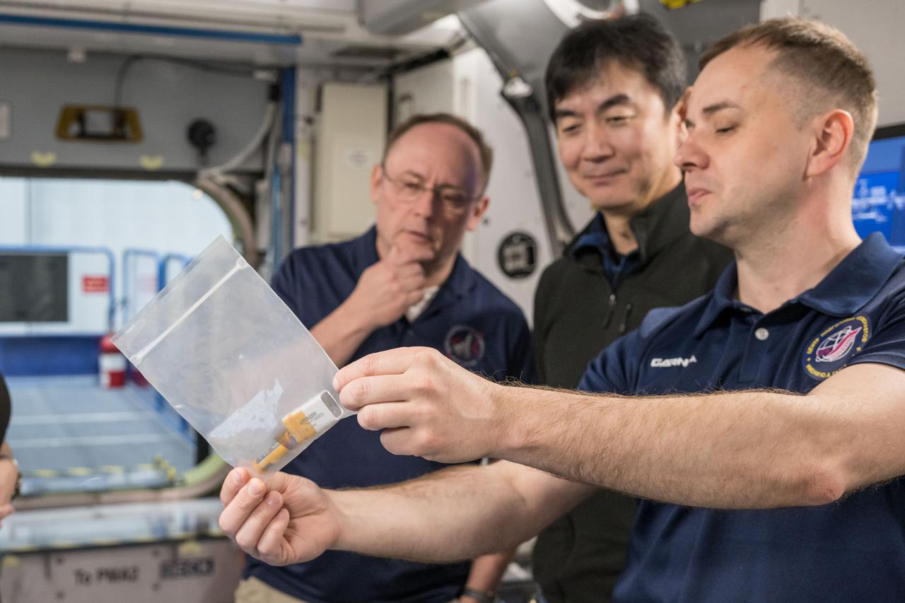jsc2025e032872 (March 20, 2025) --- From left to right, NASA astronaut Mike Fincke, JAXA astronaut Kimiya Yui, and Roscosmos Cosmonaut Oleg Platonov conduct training scenarios inside a space station mockup at NASA’s Johnson Space Center in Houston, Texas, for their upcoming mission to the International Space Station. Credit: NASA/David DeHoyos
