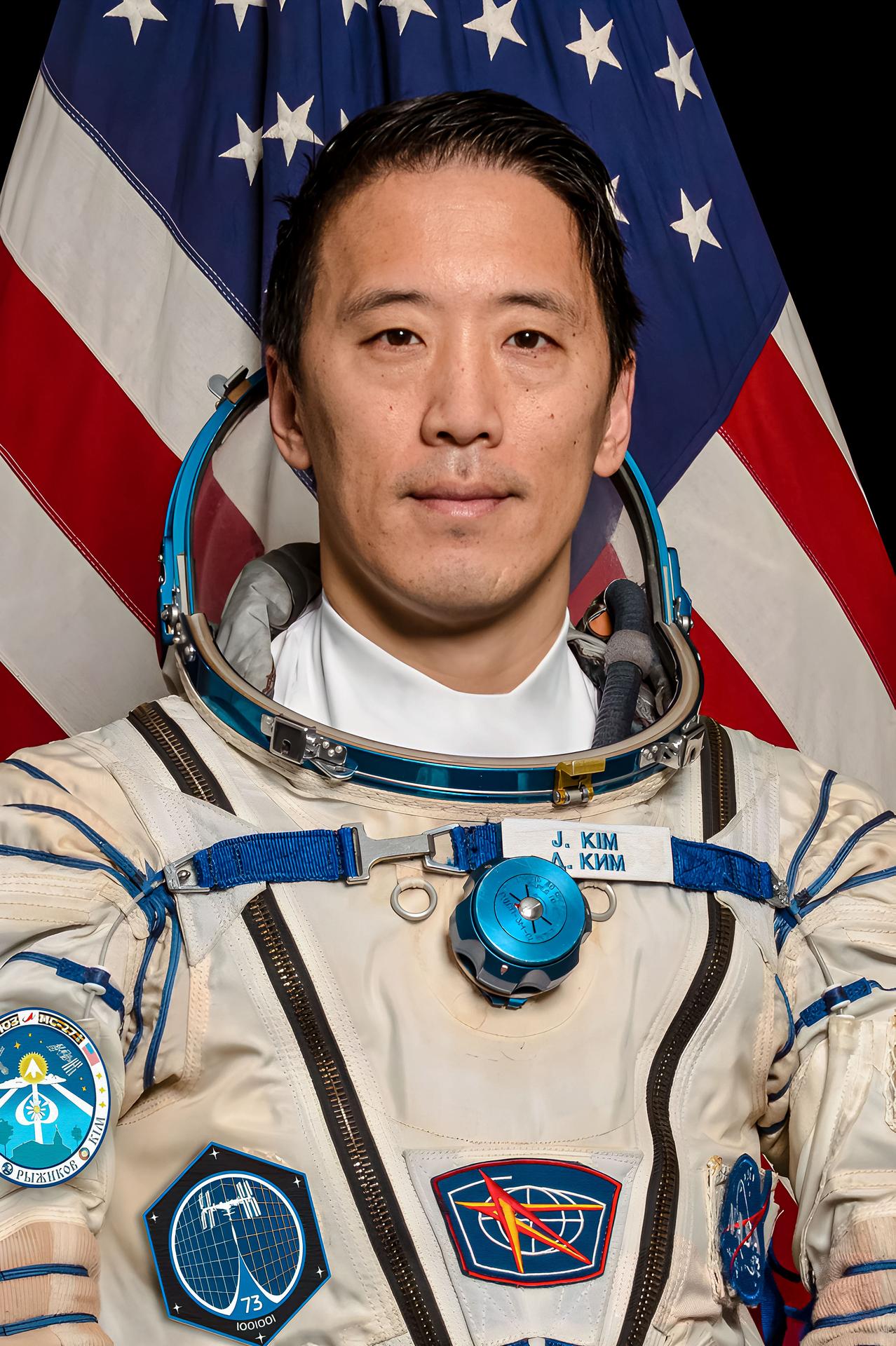 NASA astronaut and Soyuz MS-27 Flight Engineer Jonny Kim poses for a portrait in his Sokol launch and entry suit at the Gagarin Cosmonaut Training Center in Star City, Russia.