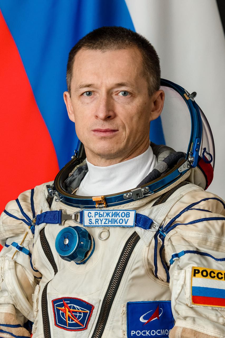 jsc2025e033526 (April 23, 2025) --- Roscosmos cosmonaut and Soyuz MS-27 Commander Sergey Ryzhikov poses for a portrait in his Sokol launch and entry suit at the Gagarin Cosmonaut Training Center in Star City, Russia.
