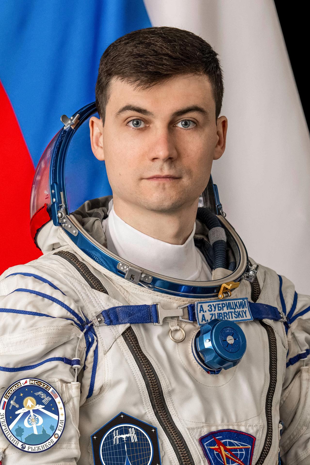 Roscosmos cosmonaut and Soyuz MS-27 Flight Engineer Alexey Zubritsky poses for a portrait in his Sokol launch and entry suit at the Gagarin Cosmonaut Training Center in Star City, Russia.