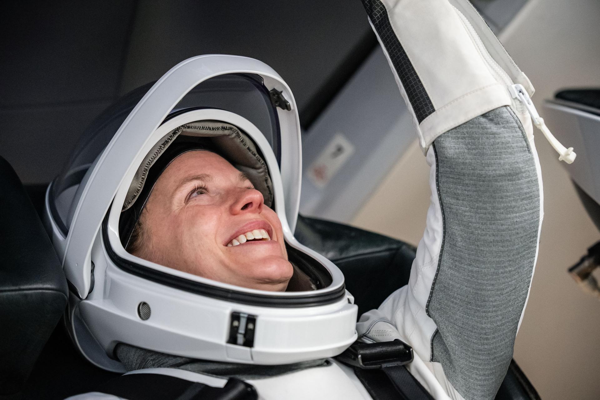 NASA astronaut Zena Cardman, commander of NASA’s SpaceX Crew-11 mission, trains inside a SpaceX Dragon mockup at a SpaceX facility in Hawthorne, California, ahead of her flight to the International Space Station.