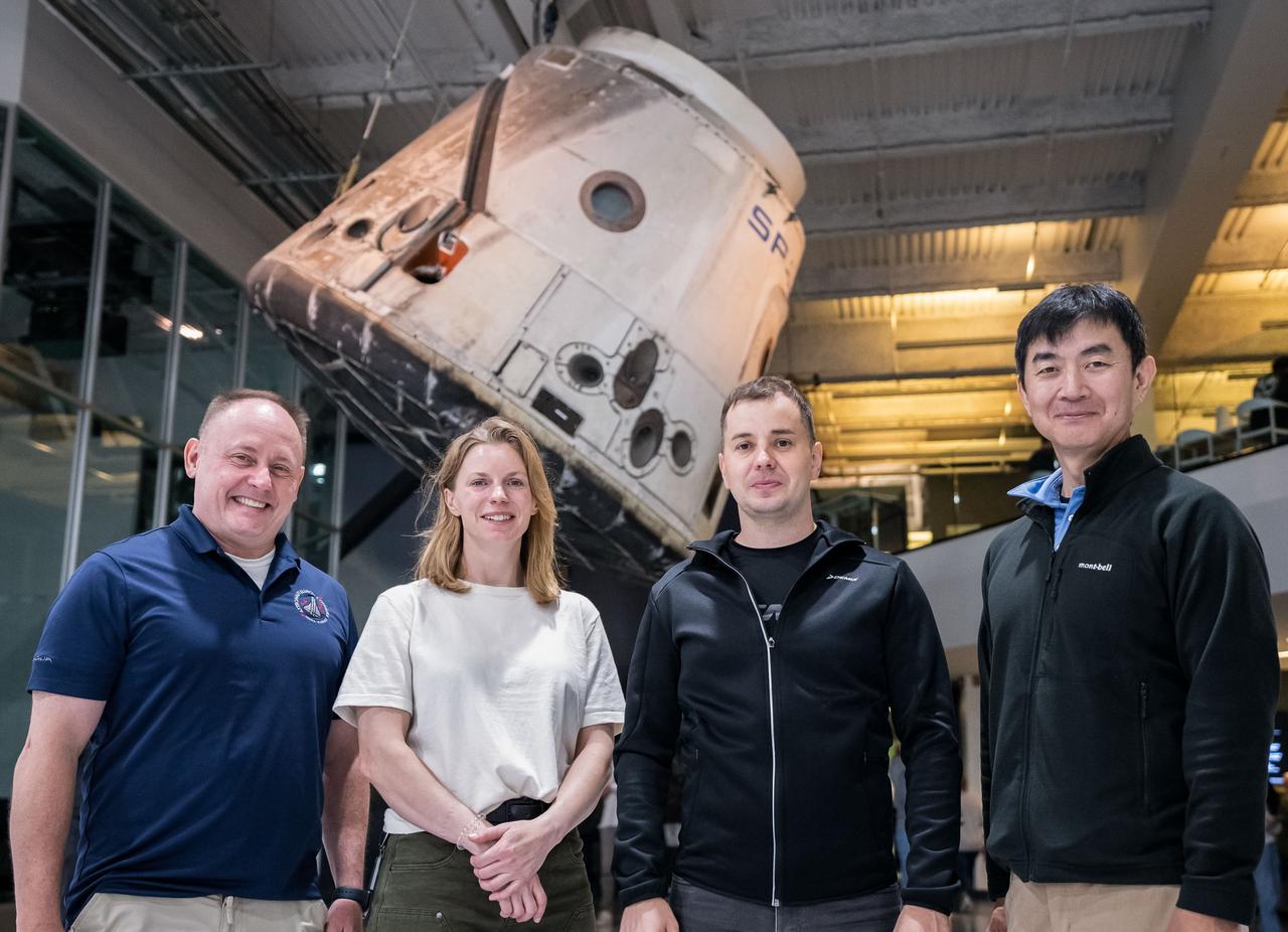 jsc2025e034094 (Sept. 25, 2024) --- From left to right, NASA astronauts Mike Fincke and Zena Cardman, Roscosmos cosmonaut Oleg Platonov, and JAXA (Japan Aerospace Exploration Agency) astronaut Kimiya Yui pose for a photo at a SpaceX facility in Hawthorne, California.