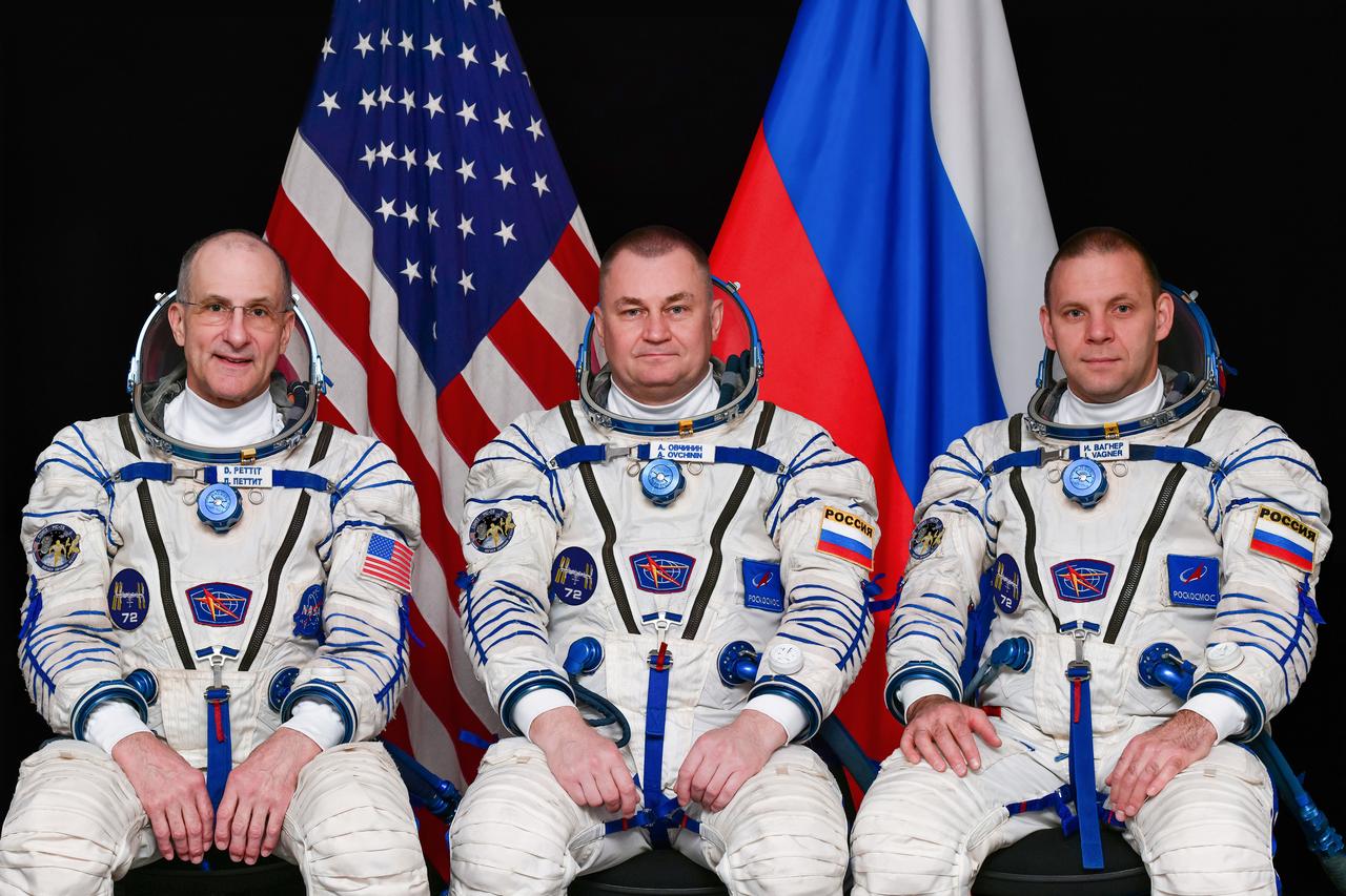 jsc2025e039013 (April 24, 2024)--- Soyuz MS-26 crew members (from left) NASA astronaut Don Pettit and Roscosmos cosmonauts Alexey Ovchinin and Ivan Vagner pose for a portrait at the Gagarin Cosmonaut Training Center in Russia. Credit: GCTC