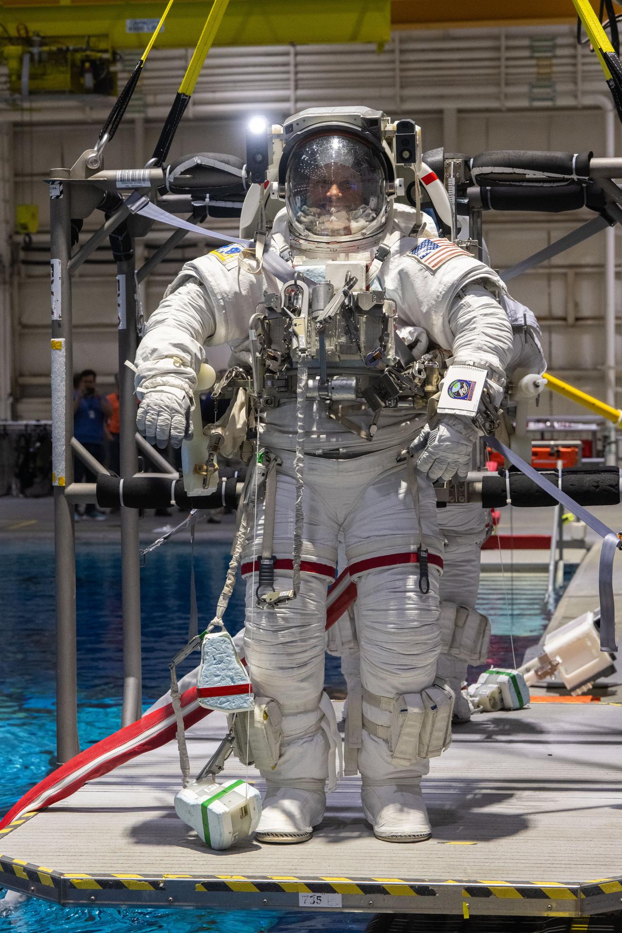 NASA astronaut and Expedition 75 flight engineer Anil Menon participates in a spacewalk training session at Johnson Space Center's Neutral Buoyancy Laboratory in Houston, Texas, ahead of his upcoming mission to the International Space Station.