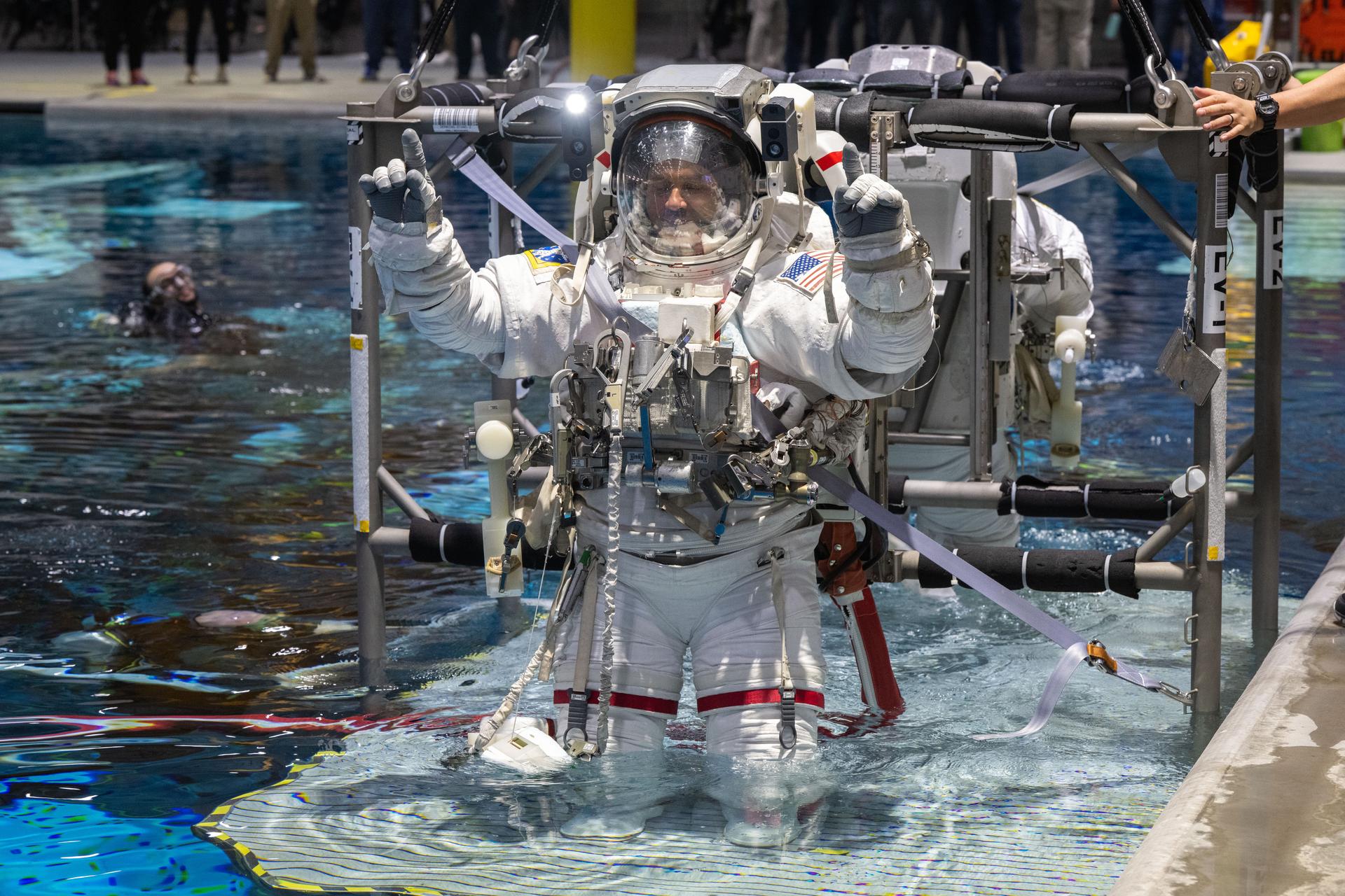 NASA astronaut and Expedition 75 flight engineer Anil Menon participates in a spacewalk training session at Johnson Space Center's Neutral Buoyancy Laboratory in Houston, Texas, ahead of his upcoming mission to the International Space Station.