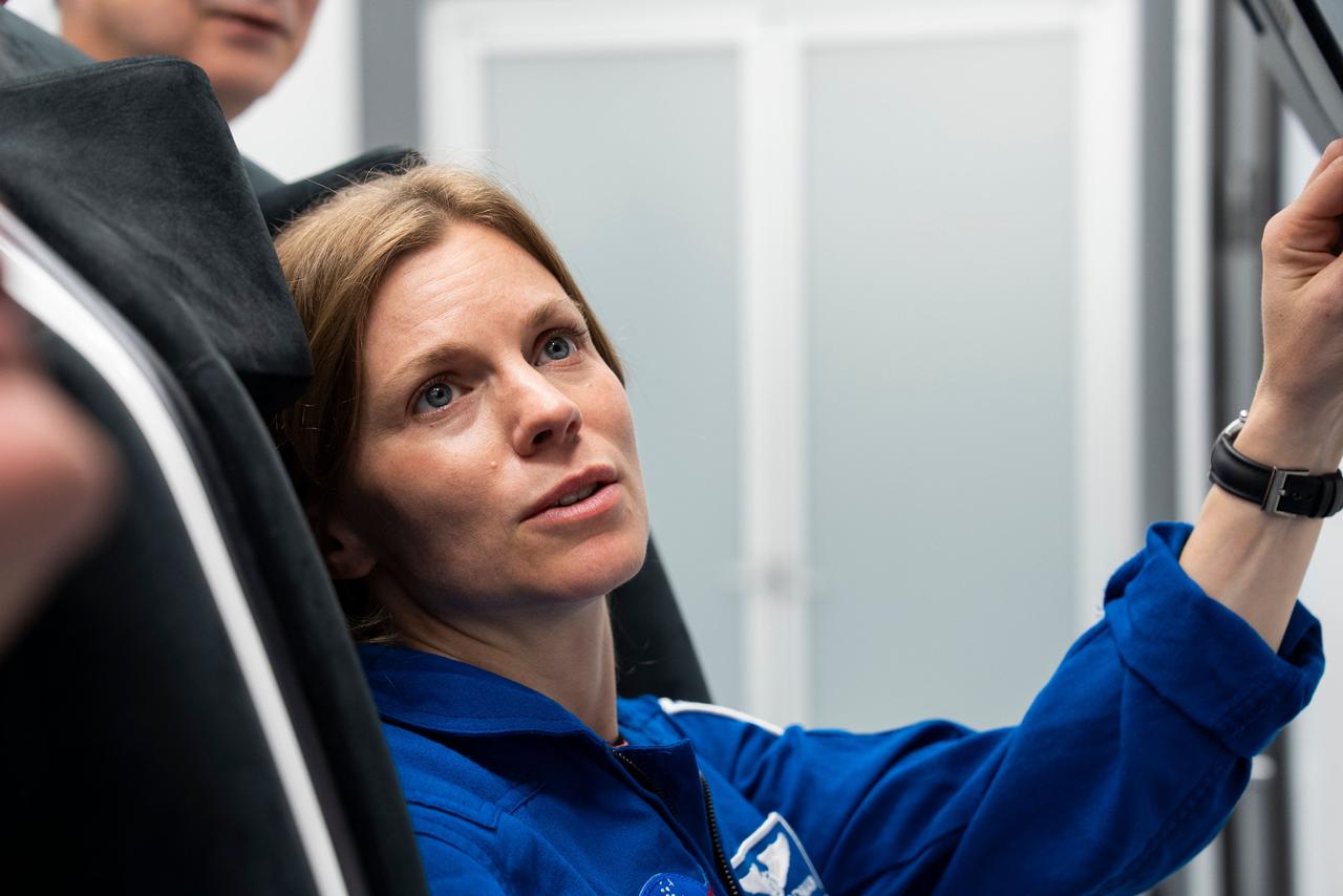 jsc2025e041085 (April 9, 2025) --- NASA astronaut Zena Cardman, commander of NASA’s SpaceX Crew-11 mission to the International Space Station trains inside a Dragon training crew spacecraft at SpaceX in Hawthorne, California.