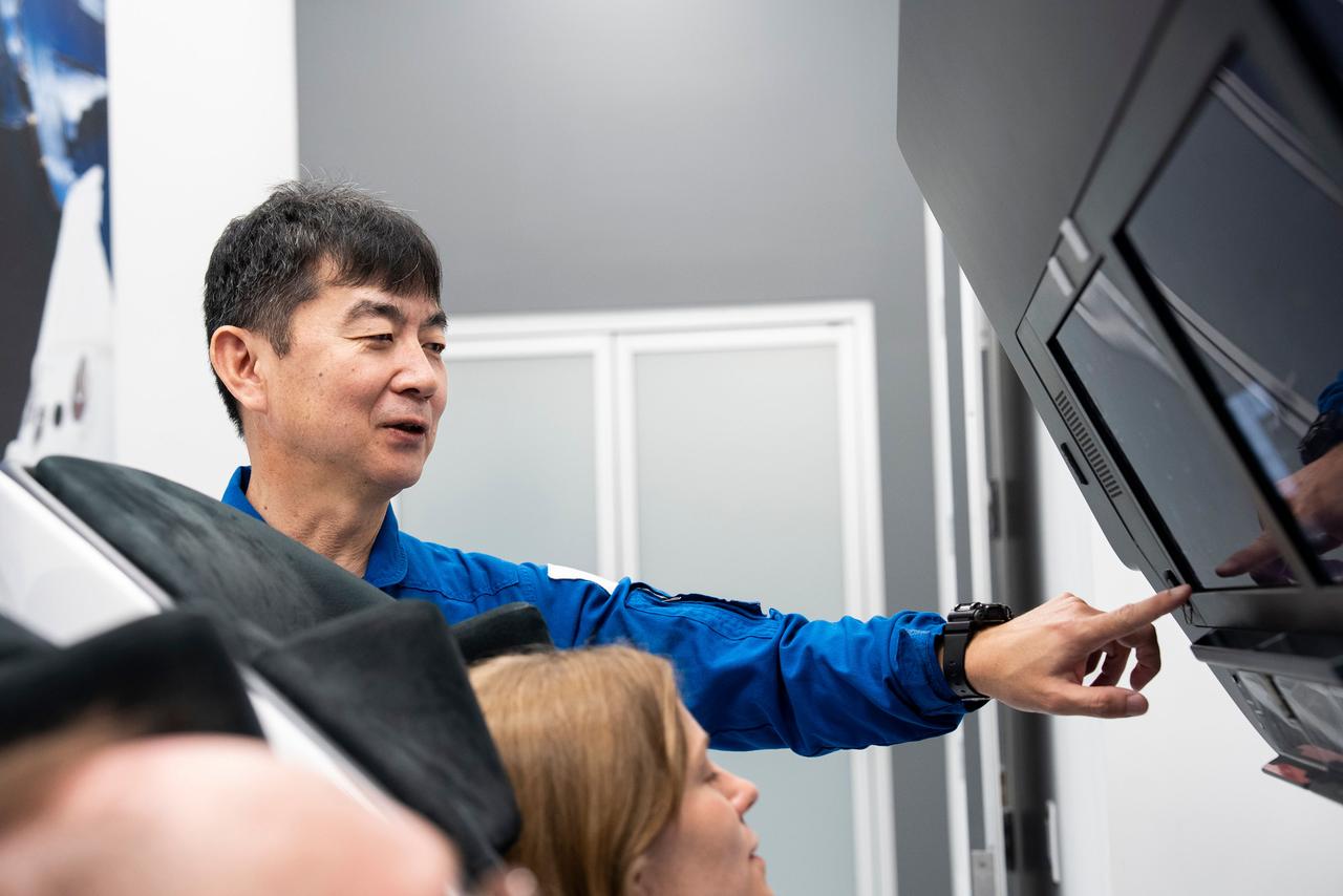 jsc2025e041090 (April 9, 2025) --- JAXA astronaut Kimiya Yui, mission specialist of NASA's SpaceX Crew-11 mission to the International Space Station trains inside a Dragon training crew spacecraft at SpaceX in Hawthorne, California.