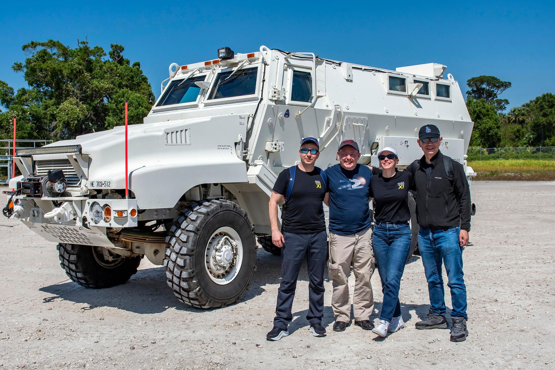 NASA’s SpaceX Crew-11 crew pose for a photo by an emergency egress vehicle at NASA’s Kennedy Space Center in Florida. Astronauts would use the emergency egress vehicle to quickly leave the launch area in the unlikely event of an emergency. From left to right: Roscosmos cosmonaut Oleg Platonov, NASA astronauts Mike Fincke and Zena Cardman, and JAXA astronaut Kimiya Yui. Credit: SpaceX
