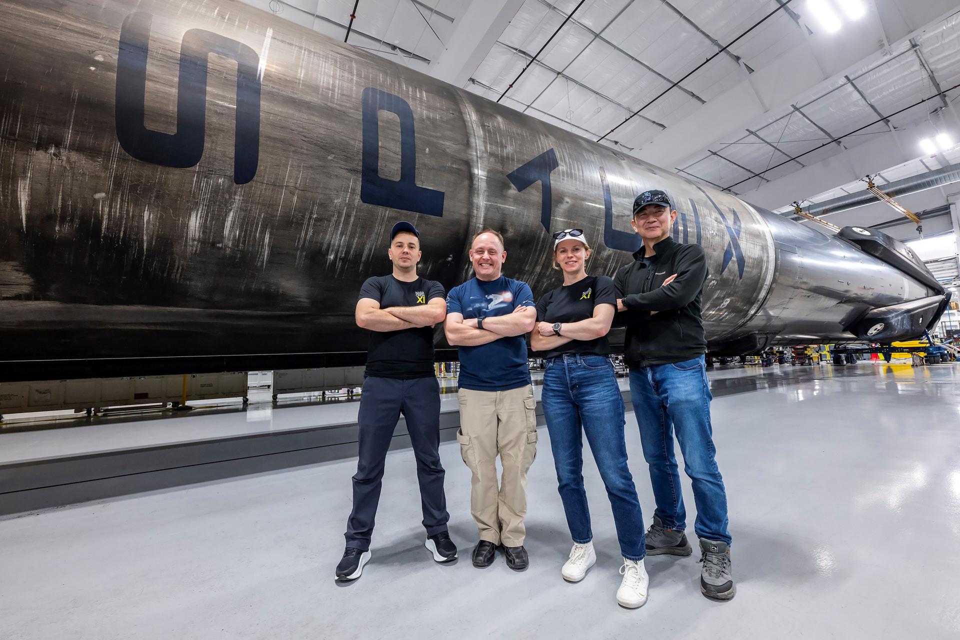 The four crew members of NASA's SpaceX Crew-11 mission to the International Space Station are pictured inside SpaceX’s Hangar X at NASA's Kennedy Space Center in Florida. From left to right: Roscosmos cosmonaut Oleg Platonov, NASA astronauts Mike Fincke and Zena Cardman, and JAXA astronaut Kimiya Yui.