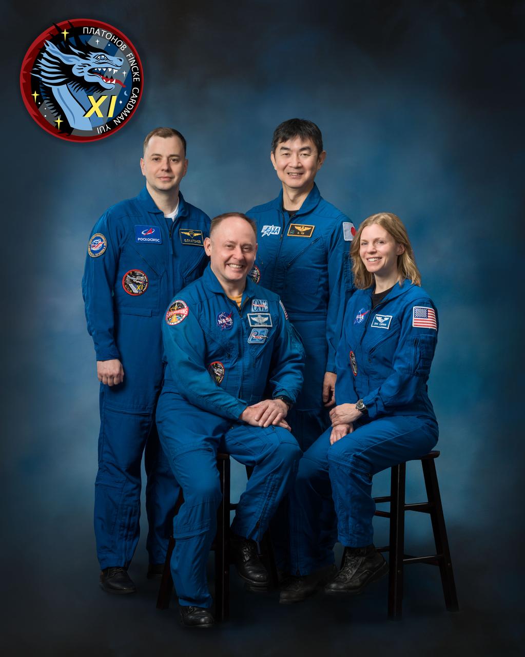 jsc2025e041955 (Feb. 26, 2025) --- The official crew portrait of NASA's SpaceX Crew-11 members. Front row, from left, are Pilot Mike Fincke and Commander Zena Cardman, both NASA astronauts. In the back from left, are Mission Specialists Oleg Platonov of Roscosmos and Kimiya Yui of JAXA (Japan Aerospace Exporation Agency).