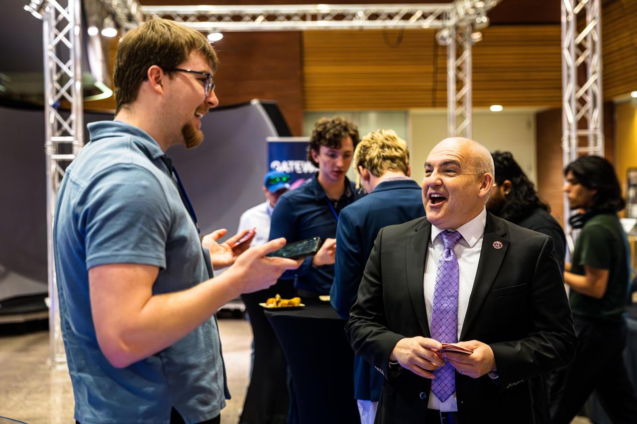Carlos Garcia-Galan, deputy manager of NASA’s Gateway Program, talks with college students about NASA internship opportunities after delivering a keynote address on Gateway, Artemis, and the next era of human space exploration at the 2025 Arizona NASA Space Grant Consortium Statewide Student Research Symposium, held April 18, 2025, at Arizona State University. 