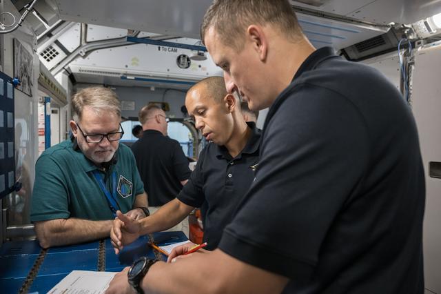 NASA image: NASA astronaut Chris Williams and Roscosmos cosmonaut Sergey Kud-Sverchkov participate in a training session