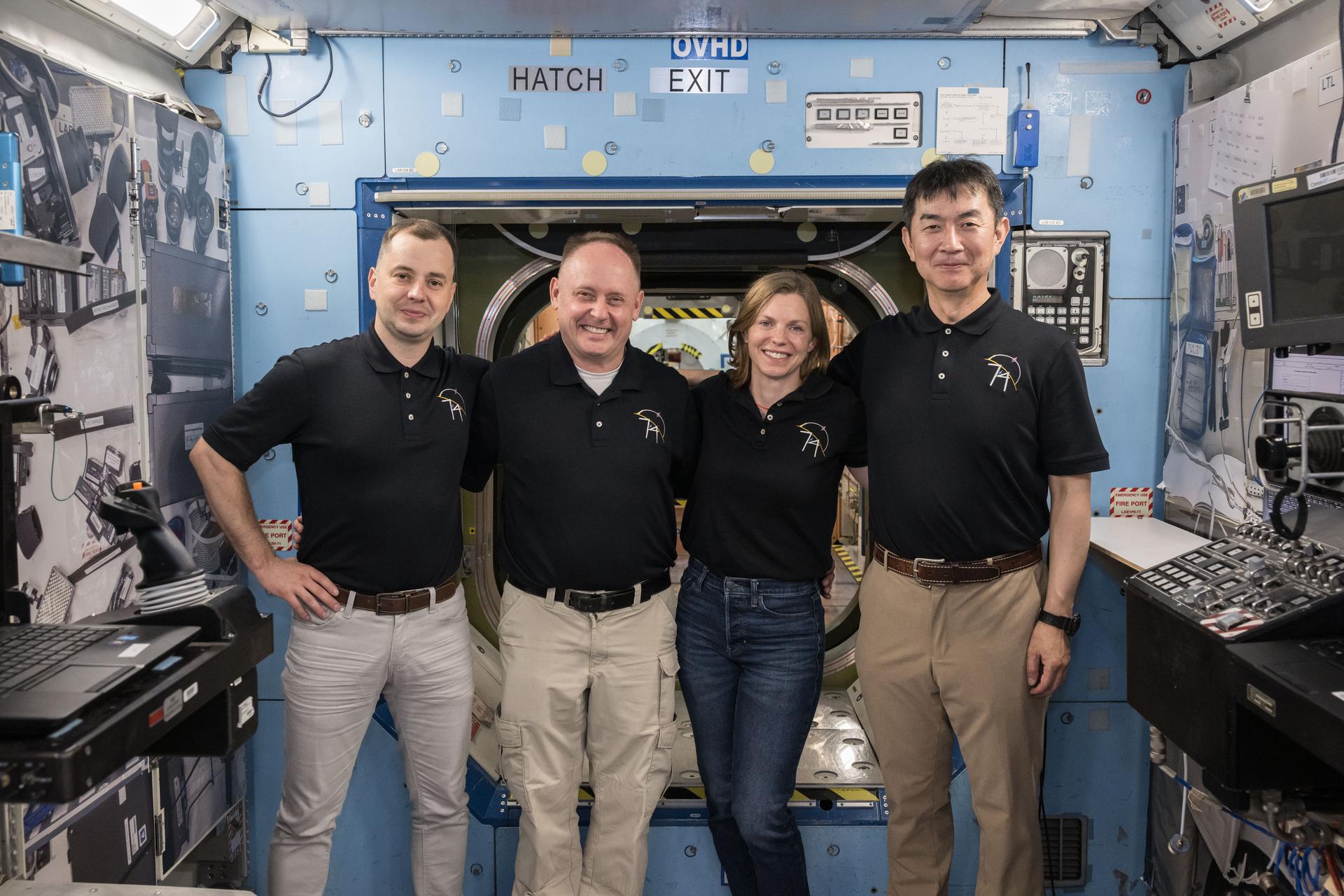 From left to right: Roscosmos cosmonaut Oleg Platonov, NASA astronauts Mike Fincke and Zena Cardman, and JAXA astronaut (Japan Aerospace Exploration Agency) Kimiya Yui pose for a photo after participating in a training simulation inside a mockup at NASA’s Johnson Space Center in Houston, Texas.
