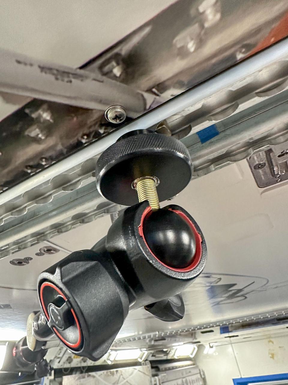 jsc2025e047411 (5/27/2025) --- The High school Students United with NASA to Create Hardware (HUNCH) has designed a device to replace Bogen arms aboard the International Space Station. The HUNCH Utility Bracket (HUB) can be attached to frames and rails and can hold cameras, iPads, and other equipment. The HUB has a jointed design that allows ample range of movement and flexibility. This device aims to aid crew members with tasks such as recording videos and holding iPads to increase efficiency of operations aboard space station. (Image courtesy of HUNCH)