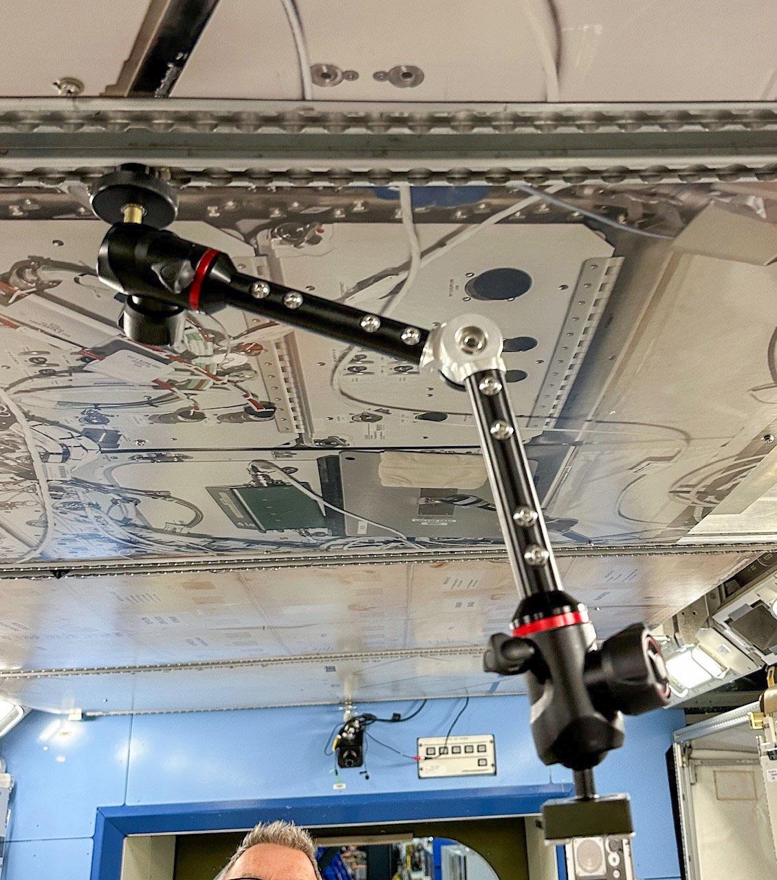 jsc2025e047412 (5/27/2025) --- The High school Students United with NASA to Create Hardware (HUNCH) has designed a device to replace Bogen arms aboard the International Space Station. The HUNCH Utility Bracket (HUB) can be attached to frames and rails and can hold cameras, iPads, and other equipment. The HUB has a jointed design that allows ample range of movement and flexibility. This device aims to aid crew members with tasks such as recording videos and holding iPads to increase efficiency of operations aboard space station. (Image courtesy of HUNCH)