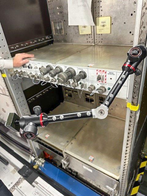 jsc2025e047418 (5/27/2025) --- The High school Students United with NASA to Create Hardware (HUNCH) has designed a device to replace Bogen arms aboard the International Space Station. The HUNCH Utility Bracket (HUB) can be attached to frames and rails and can hold cameras, iPads, and other equipment. The HUB has a jointed design that allows ample range of movement and flexibility. This device aims to aid crew members with tasks such as recording videos and holding iPads to increase efficiency of operations aboard space station. (Image courtesy of HUNCH)