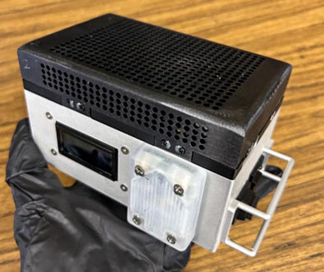 jsc2025e059518 (617/2025) --- A preflight view of the Portable Tunable Laser Spectrometer (PTLS) sensor package. PTLS uses a sensor network to measure the distribution of carbon dioxide, water vapor, and oxygen over time. Image courtesy of JPL.