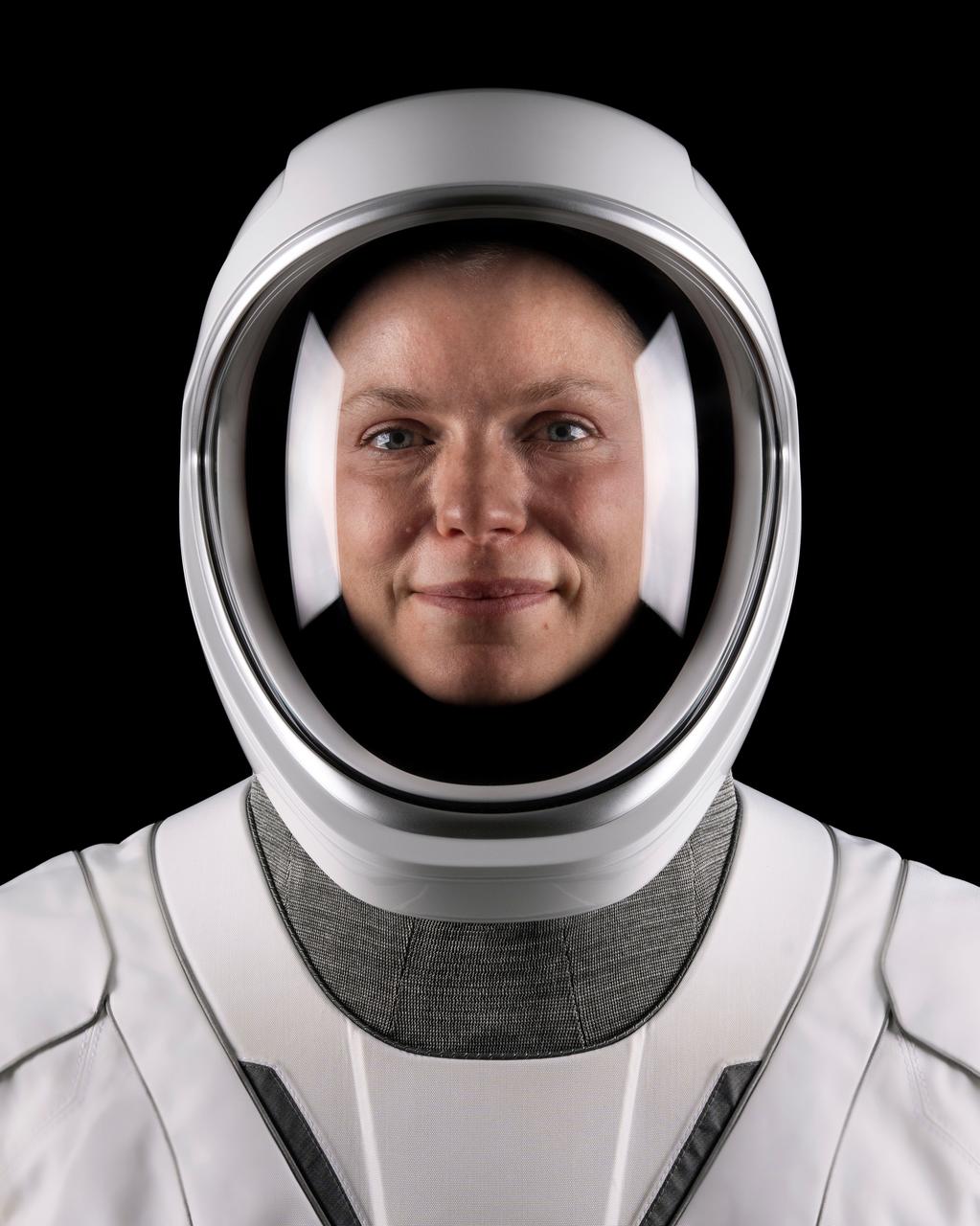 jsc2025e060299 (May 19, 2025) --- NASA astronaut Zena Cardman, commander of NASA’s SpaceX Crew-11 mission to the International Space Station, poses for a portrait in his pressure suit at SpaceX headquarters in Hawthorne, California. Credit: SpaceX