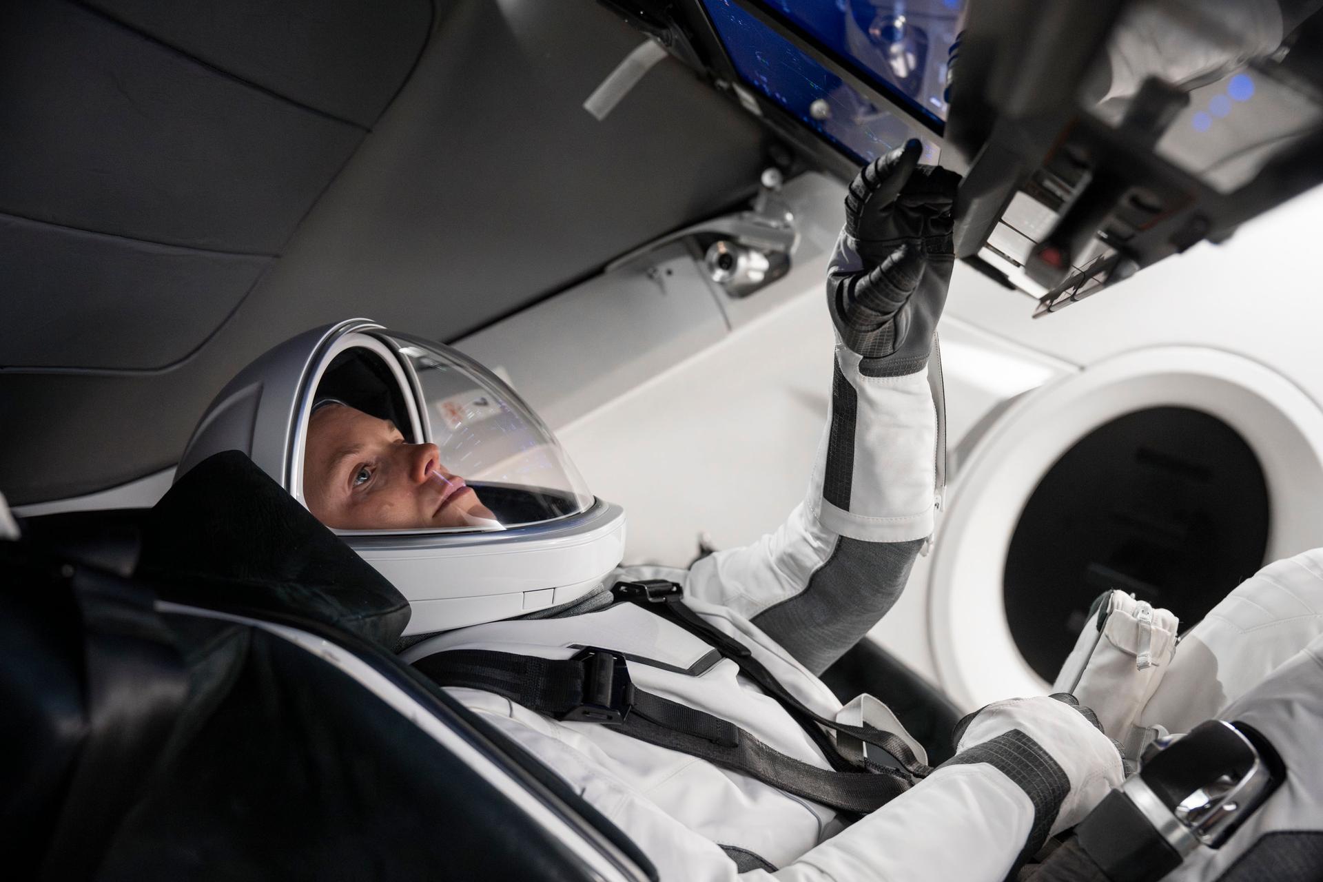 NASA’s SpaceX Crew-11 commander and NASA astronaut Zena Cardman is pictured training inside a mockup of a Dragon cockpit at SpaceX facilities in Hawthorne, California. Credit: SpaceX
