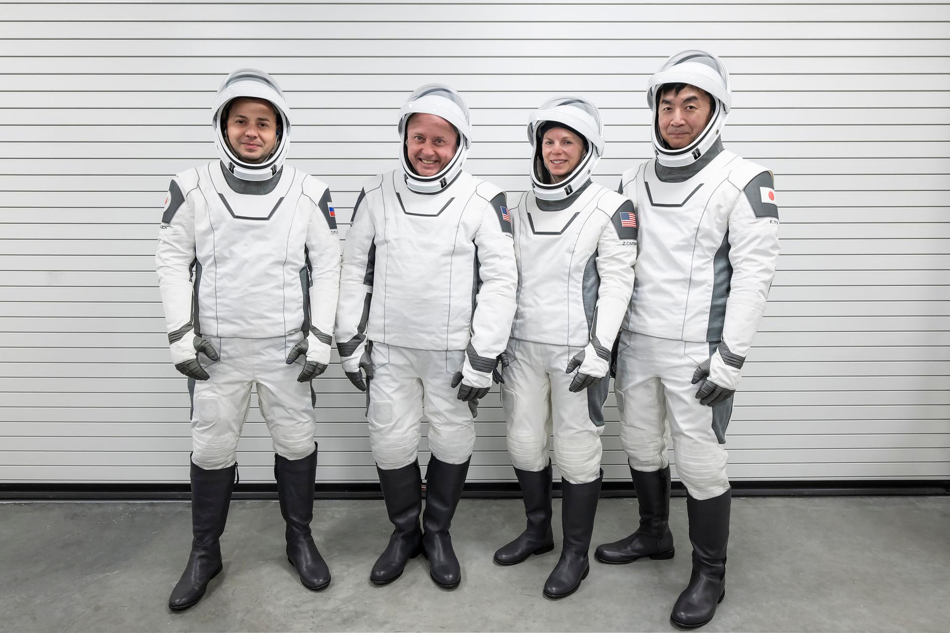 The crew of NASA’s SpaceX Crew-11 mission pose for a photo during a training session for their upcoming trip to the International Space Station at SpaceX facilities in Florida. From left: Oleg Platonov, Mike Fincke, Zena Cardman, and Kimiya Yui.